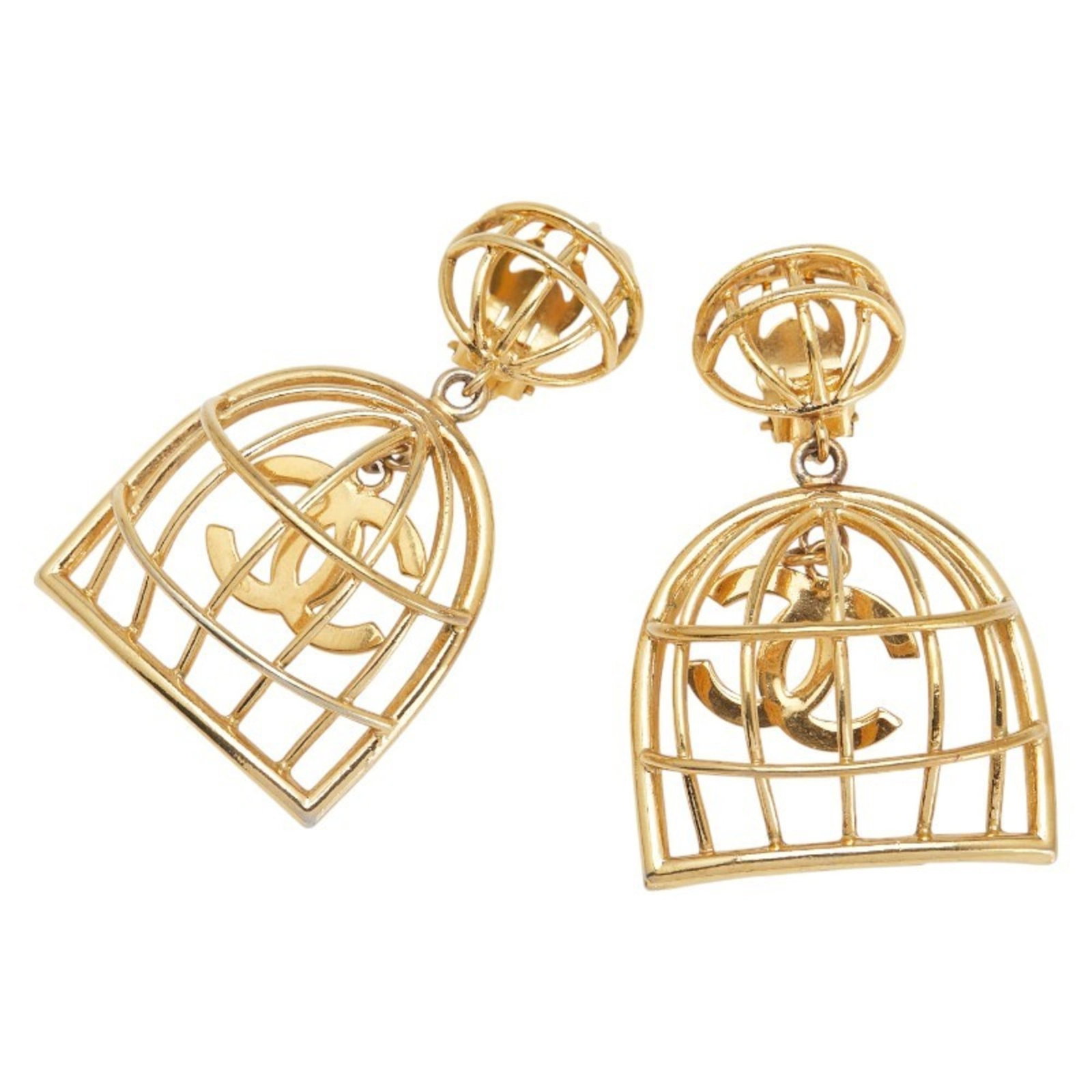 Clip earrings by Chanel: Clip earrings by Chanel Clip earrings by Chanel, crafted in gold, bear the signature of the renowned fashion house. Measuring 67.60mm x 39.90mm, these elegant earrings are a testament to Chanel's time