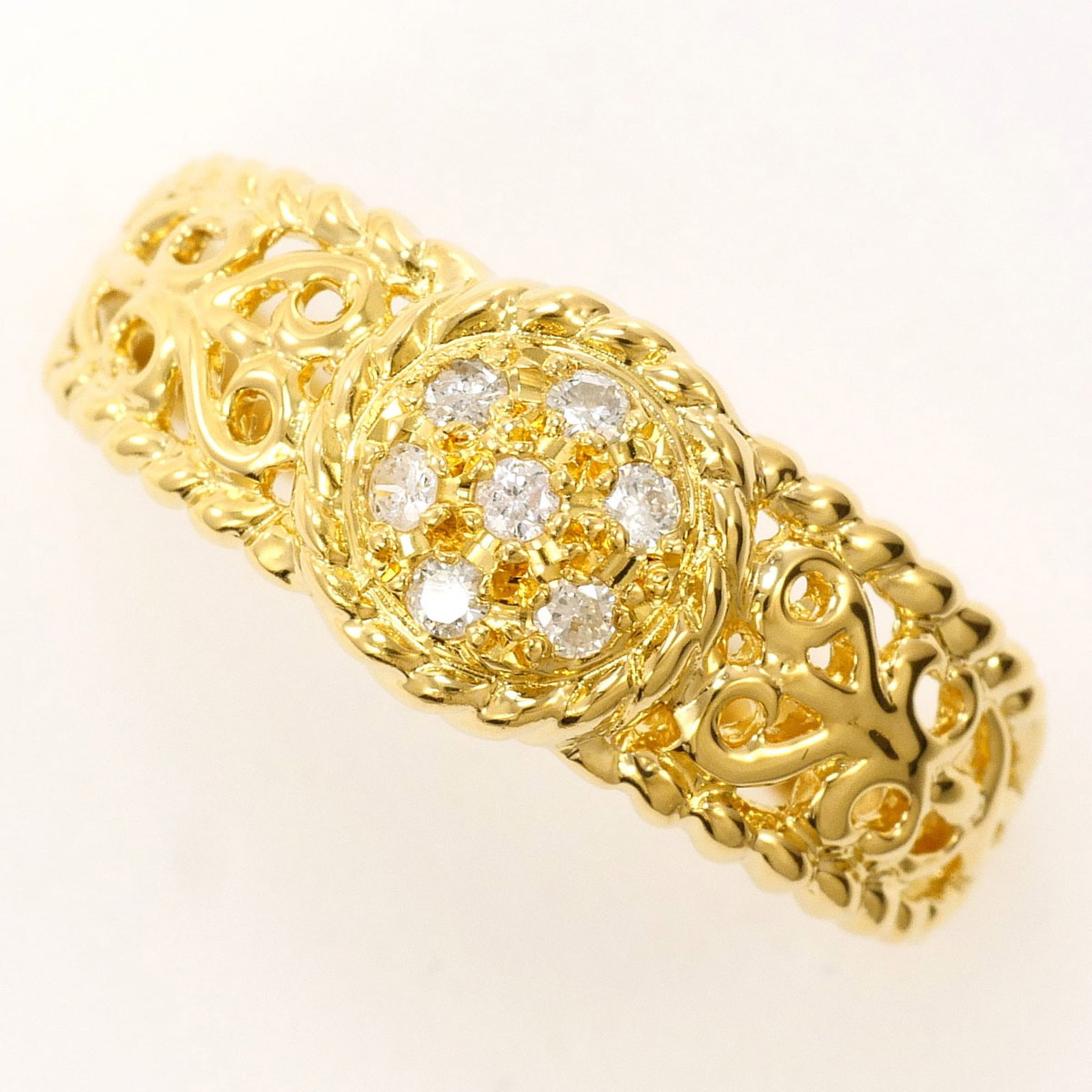Unbranded Band Ring Yellow Gold (18K): Unbranded Band Ring Yellow Gold (18K) Yellow gold band ring with a diamond weighing 0.15 carats, crafted from 18K metal and available in US size 9.5 and Japanese size 19.5. This unbranded piece