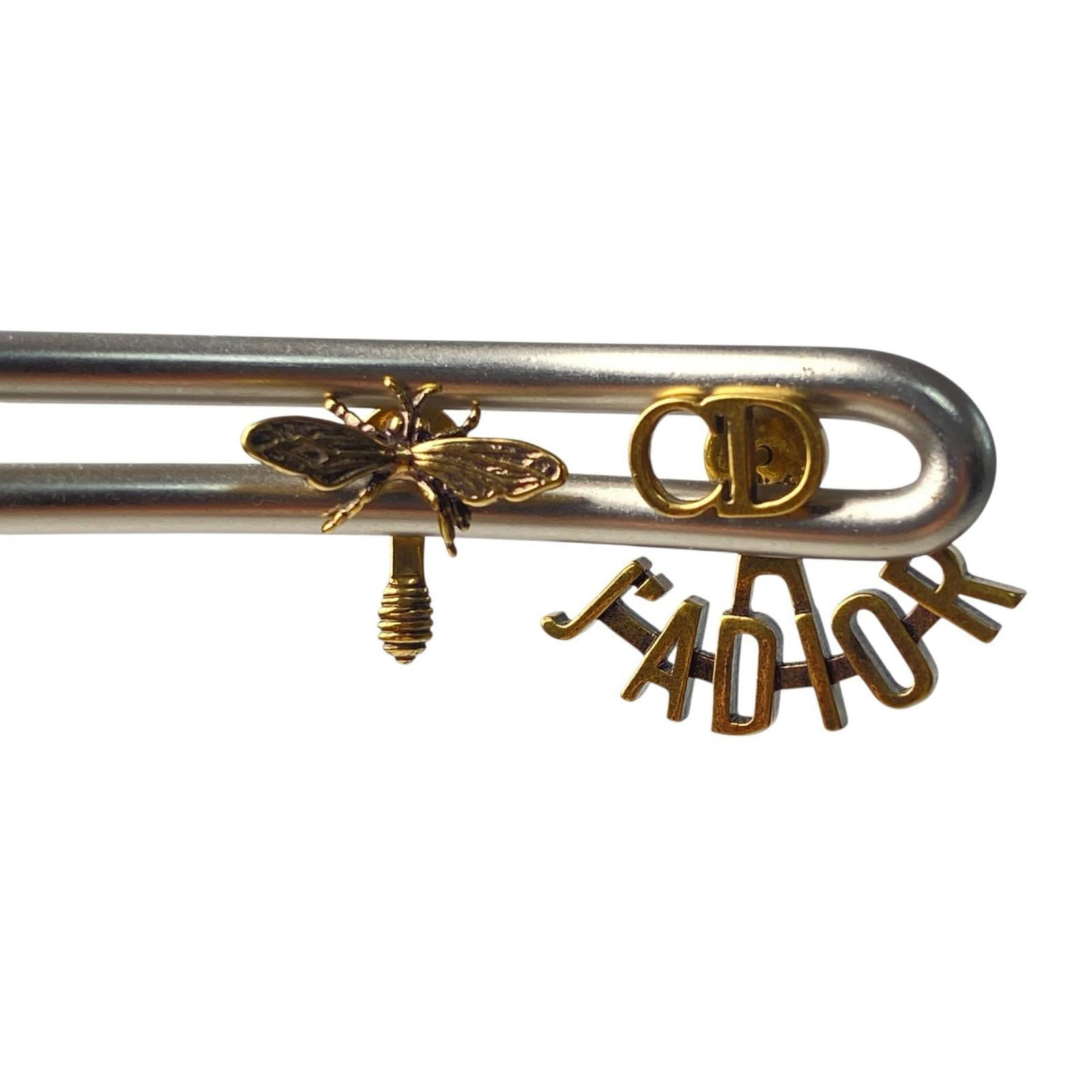 Dior Stud Christian Earrings: Dior Stud Christian Earrings Stud earrings in gold from Christian Dior, bearing the brand's signature. These elegant accessories feature a classic design with a subtle touch of luxury. The simple yet