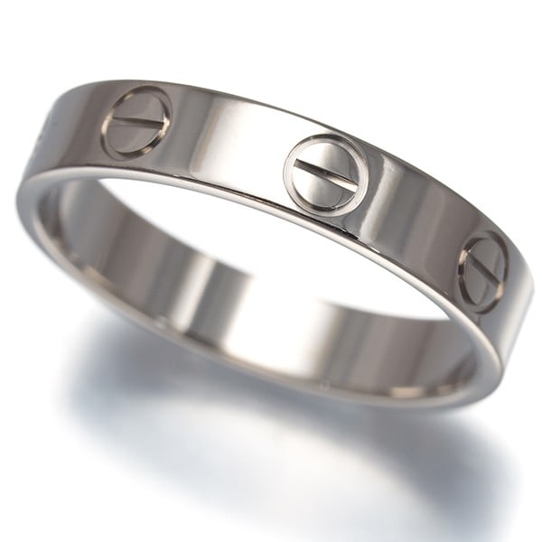 Cartier Ring Love Sm Eu51 18K 750 White Gold: Cartier Ring Love Sm Eu51 18K 750 White Gold Cartier's iconic Love Ring in 18k white gold, featuring a sleek and modern design with no main stone. This elegant ring boasts a slender profile and