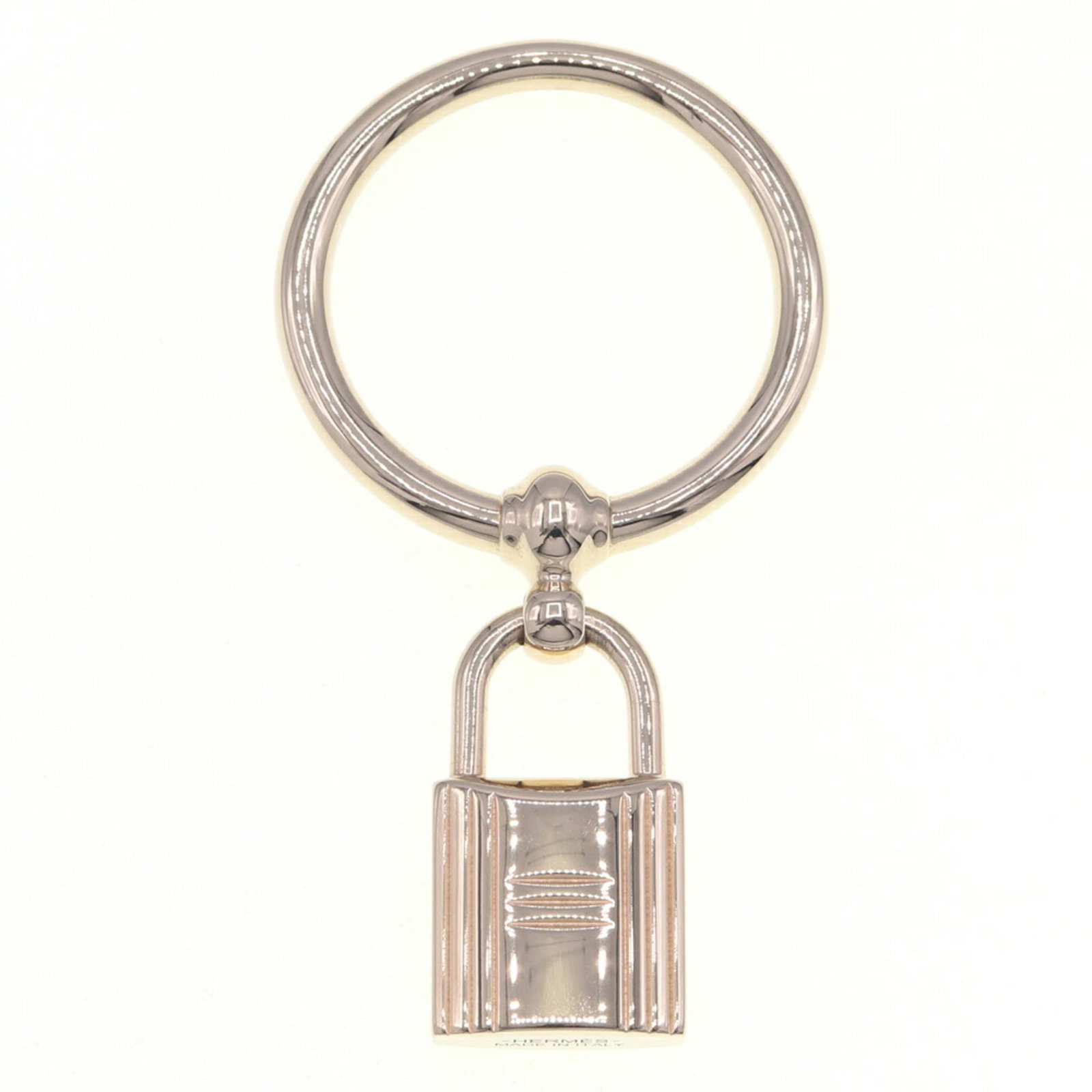 Metal charm handbag Hermes: Metal charm handbag Hermes Metal charm handbag from Hermes, crafted in gold metal. This elegant accessory features no additional accessories. Made entirely of metal with a gold finish, it showcases