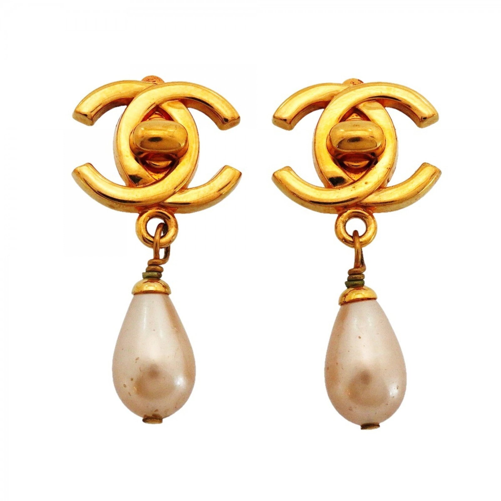 Chanel Clip Earrings Gold Plating: Chanel Clip Earrings Gold Plating Gold-plated clip earrings from Chanel, featuring a sleek and sophisticated design. Made with high-quality gold plating, these earrings offer a touch of luxury and