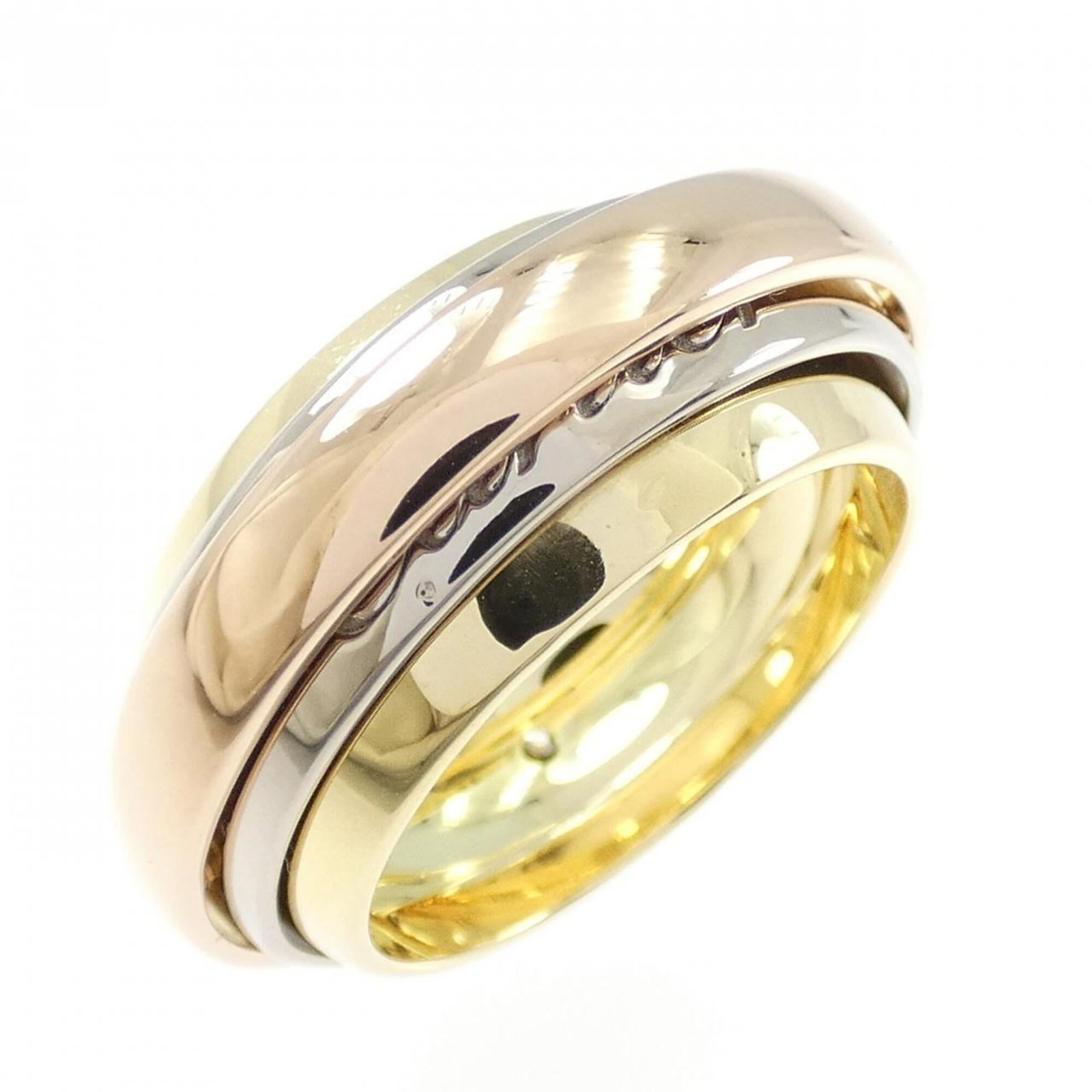 Ring from Cartier: Ring from Cartier Cartier's Trinity ring boasts an elegant pink, white, and yellow gold design. The 18K gold band features a slim profile with a width of 8.9mm, making it a stylish accessory for