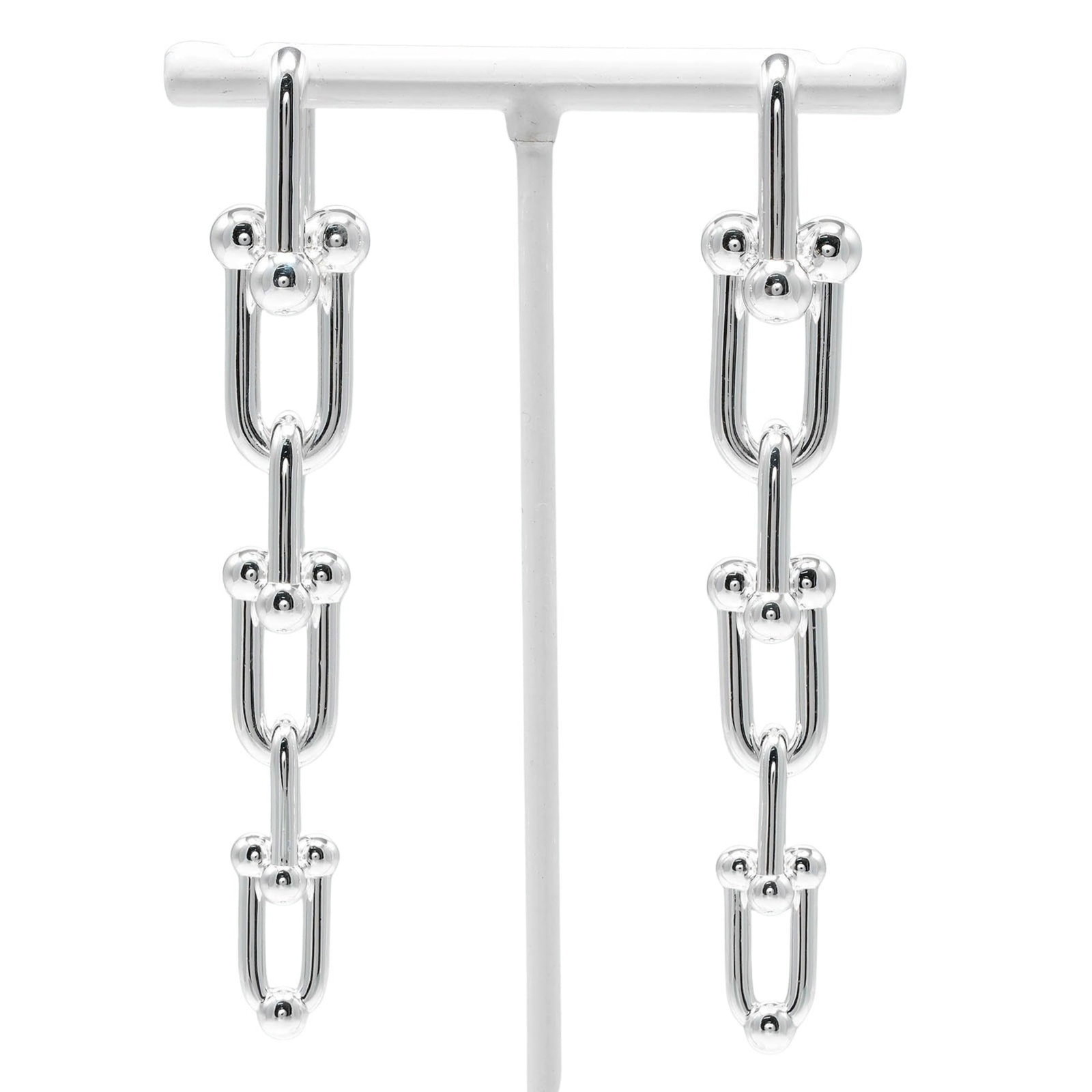 Tiffany Stud Earrings Silver 925: Tiffany Stud Earrings Silver 925 Silver 925 stud earrings from Tiffany, featuring a sleek and modern design. Made with high-quality silver, these earrings boast a classic look that pairs well with eve