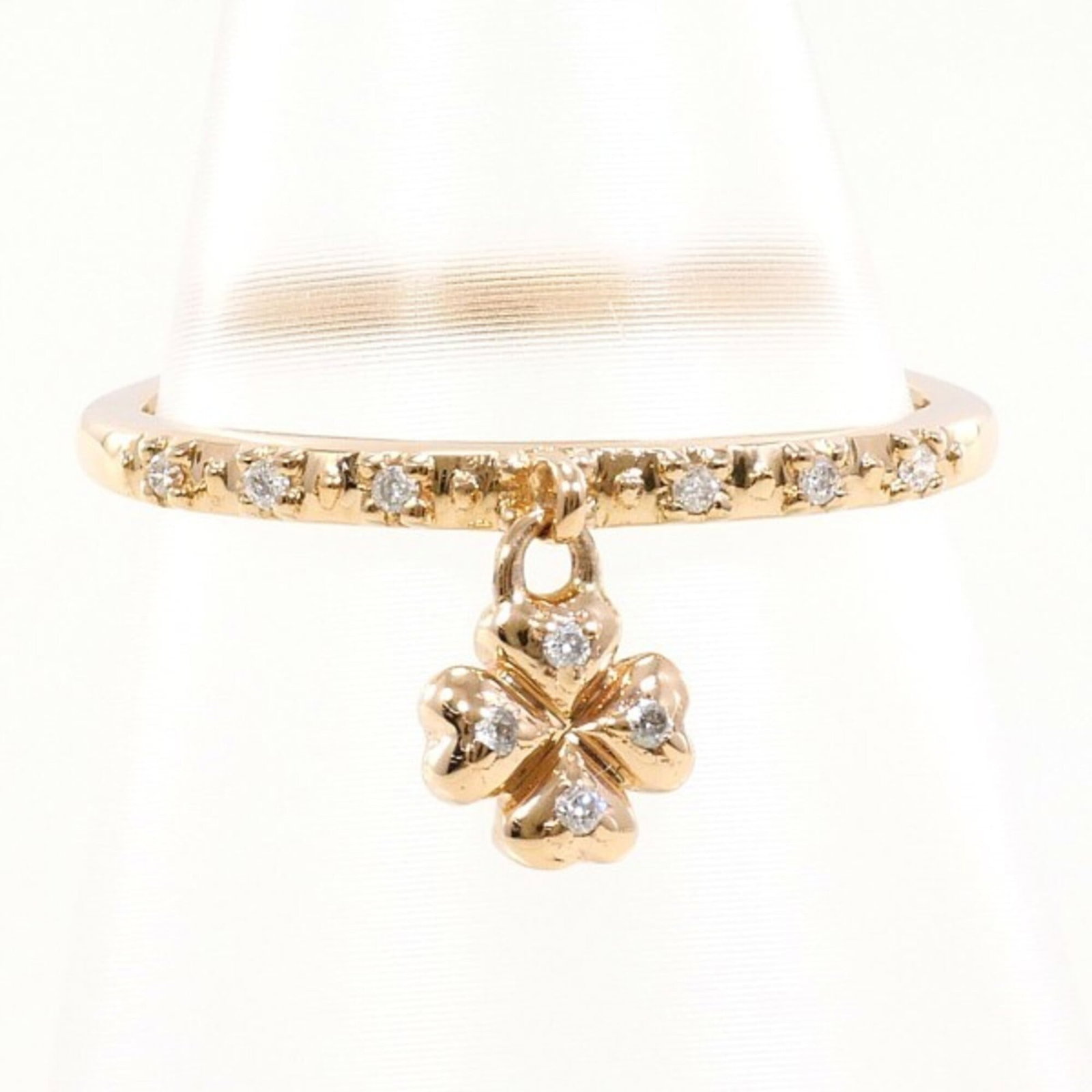 Pink Gold Ring Folli Follie Band (10K): Pink Gold Ring Folli Follie Band (10K) Pink gold Folli Follie band ring features a diamond stone weighing 0.04 carats, set in a 10K pink gold setting with a US size 4 and JP size 7.5 fit. The ring's w