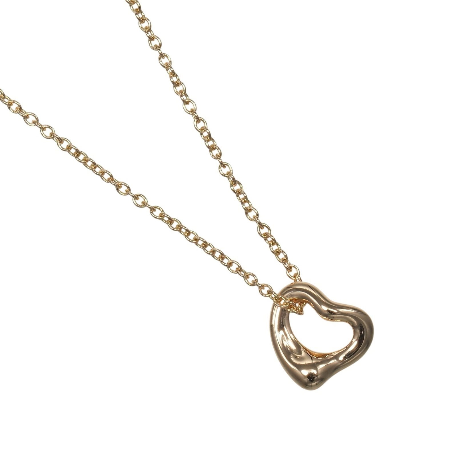 Tiffany & Co. Open Heart Necklace 7Mm Model 18K Pink Gold Approx. 1.6G.: Tiffany & Co. Open Heart Necklace 7Mm Model 18K Pink Gold Approx. 1.6G. Tiffany & Co.'s iconic Open Heart Necklace is showcased in this stunning 18K pink gold piece, measuring approximately 1.6