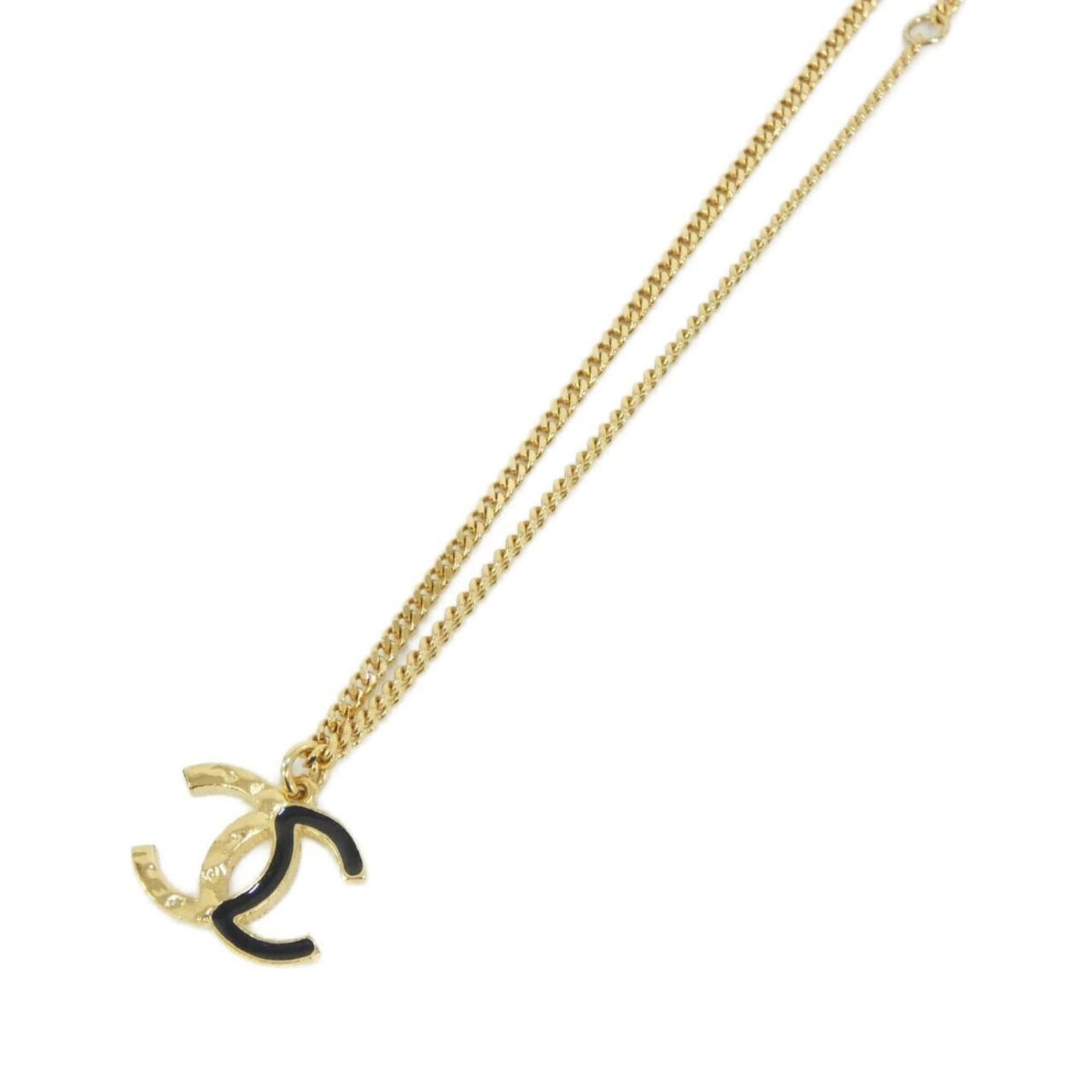 Abc480 Necklace By Chanel: Abc480 Necklace By Chanel The Abc480 Necklace by Chanel boasts sleek, sophisticated design with a striking black and gold combination. Featuring a 22mm x 23mm pendant that fits comfortably within a