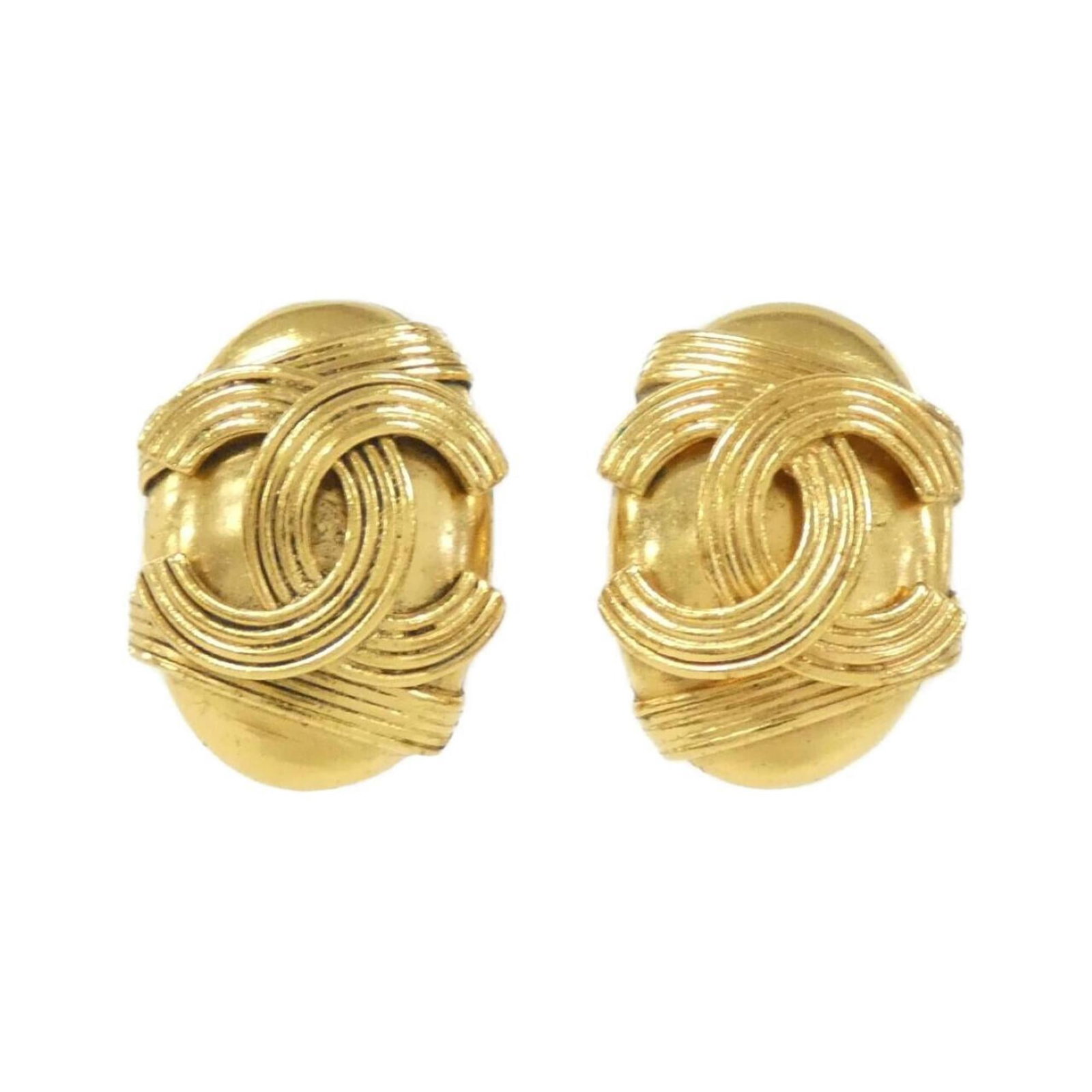 Clip earrings by Chanel: Clip earrings by Chanel Clip earrings by Chanel, featuring a gold finish and precise dimensions. Made with attention to detail, these clip earrings showcase the iconic style of the renowned fashion