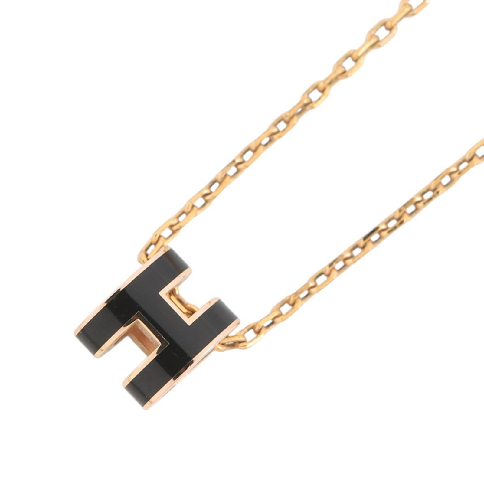 Hermes Mini Pop H Necklace Black Hermes Necklace: Hermes Mini Pop H Necklace Black Hermes Necklace Gold plating, lacquer finish adds a touch of luxury to this mini pop H necklace from Hermes. The gold color and 9mm x 7mm pendant size make it a stylis