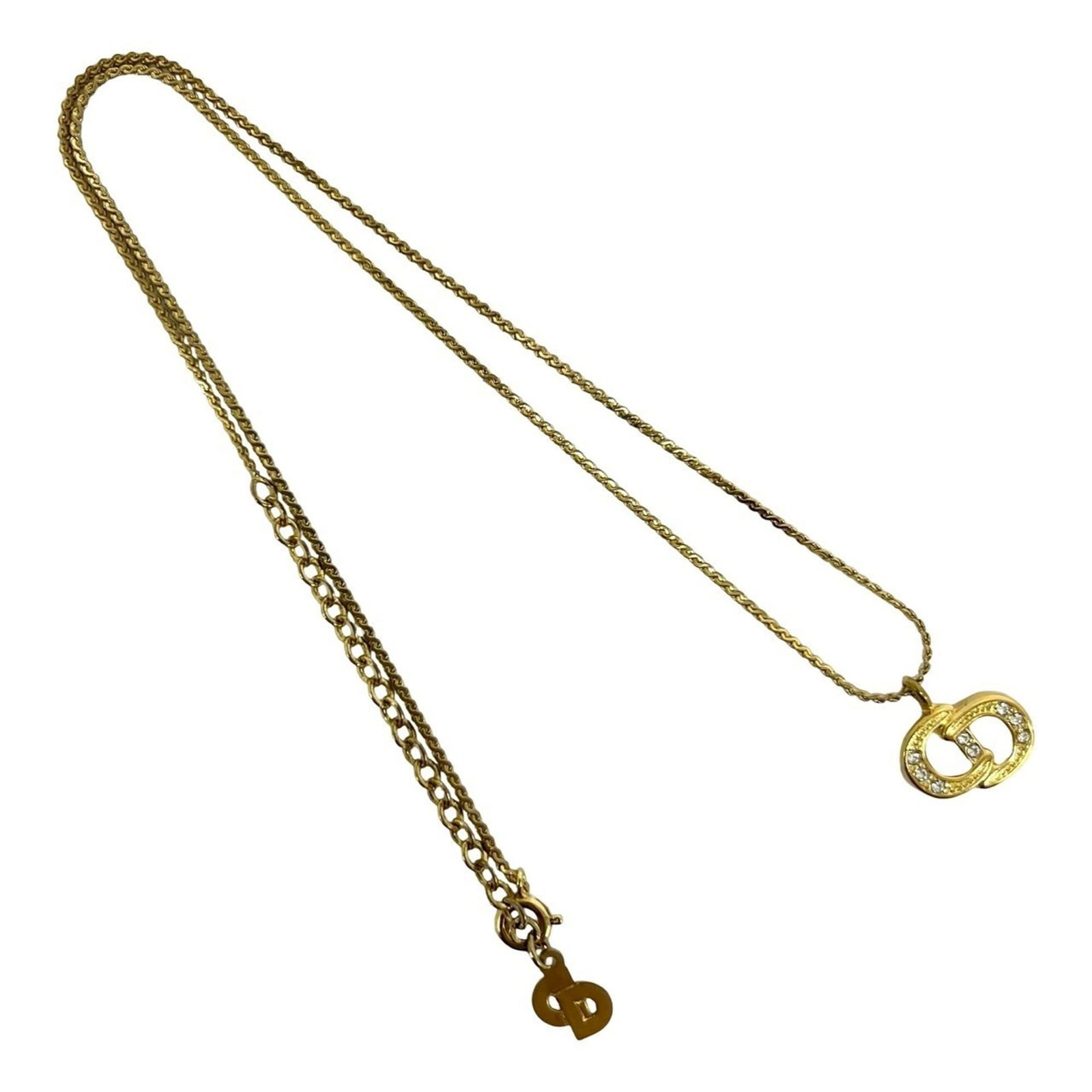 Dior Christian Cd Motif Gp Rhinestone Accessory Necklace Gold Pendant: Dior Christian Cd Motif Gp Rhinestone Accessory Necklace Gold Pendant Gold plating and rhinestones adorn the Dior Christian Cd Motif Gp Necklace, adding a touch of luxury to any outfit. The gold