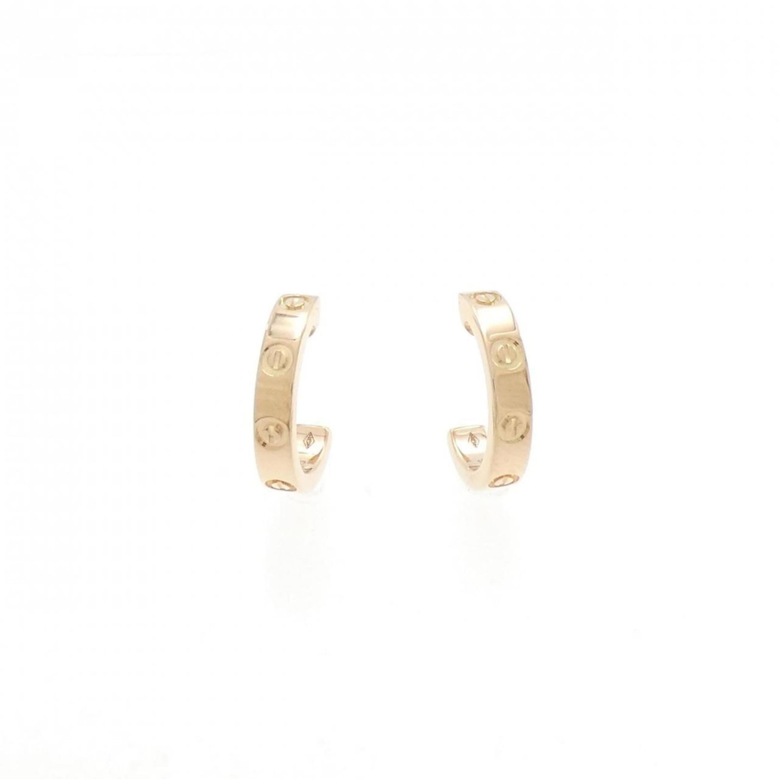 Cartier Half Hoop Earrings Pink Gold (18K): Cartier Half Hoop Earrings Pink Gold (18K) Pink gold (18K) Cartier half hoop earrings with a sleek, modern design. Measuring 12.40mm in height and 2.60mm in width, these elegant earrings showcase the