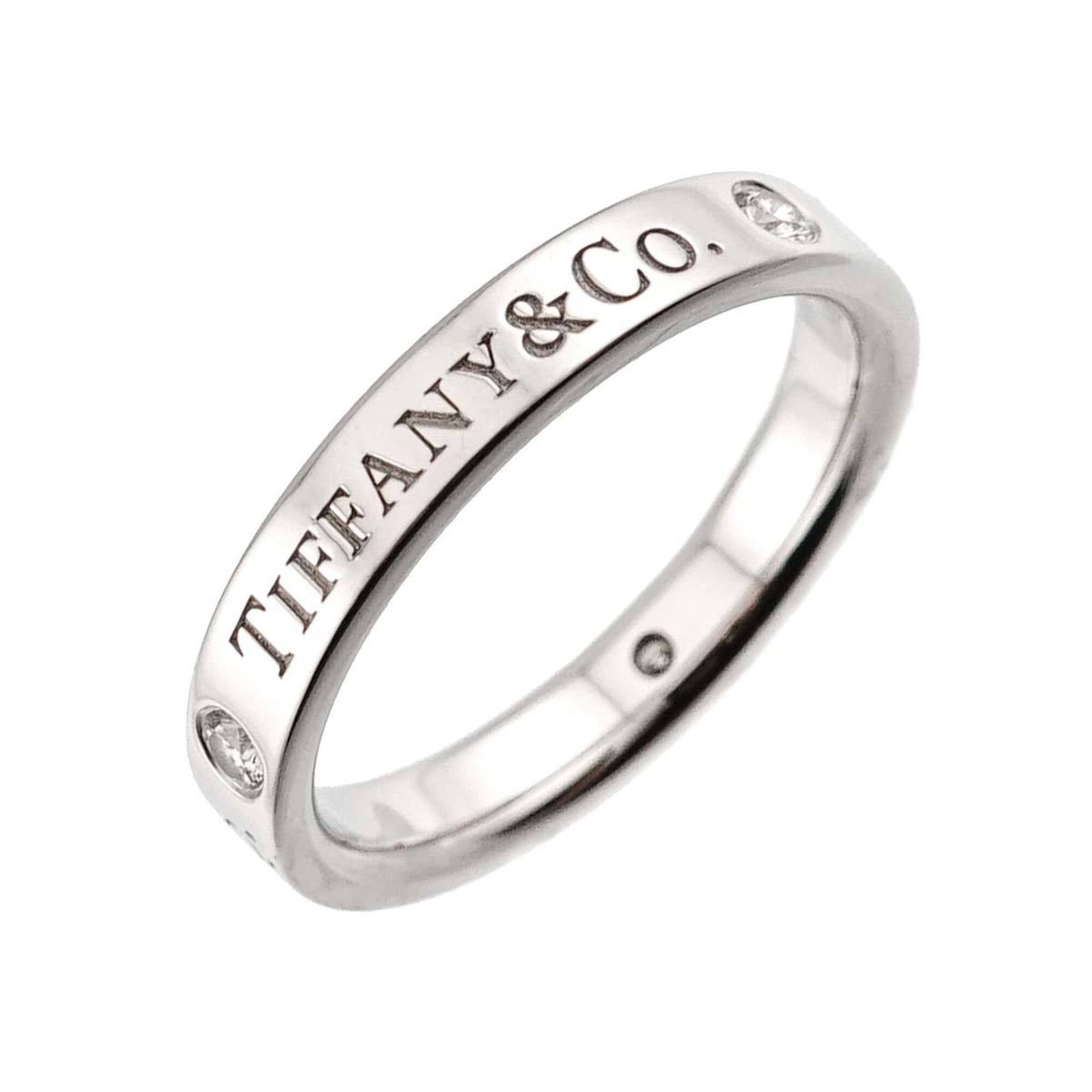 Tiffany platinum ring band: Tiffany platinum ring band Platinum band ring from Tiffany, available in US size 4 and Japanese size 7.5, crafted from high-quality platinum material. This elegant ring features a classic design with
