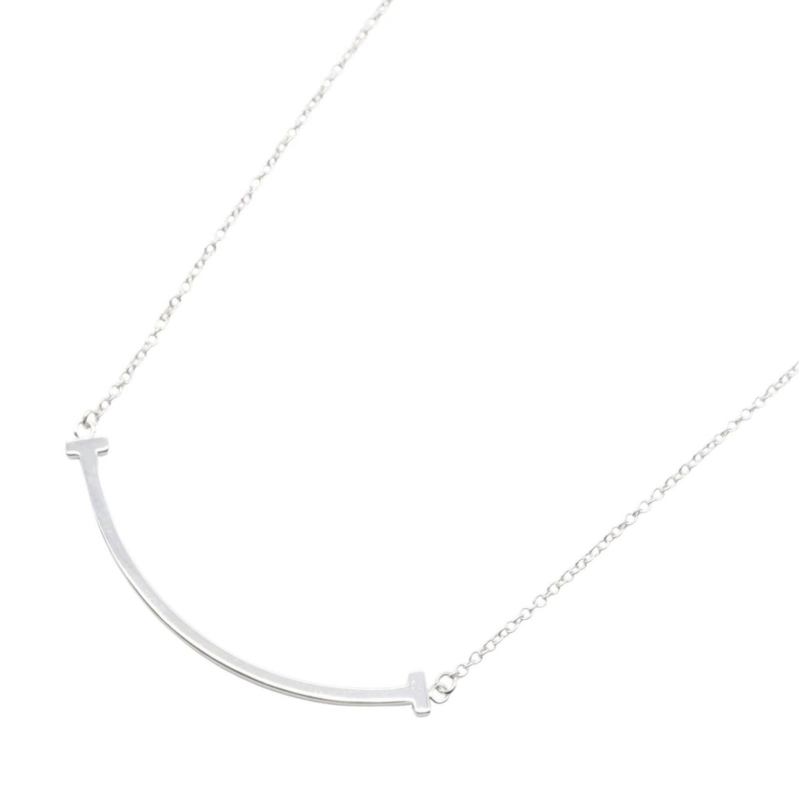 Tiffany & Co. T Smile Small Necklace 18K White Gold (Wg) Women'S Silver Tone: Tiffany & Co. T Smile Small Necklace 18K White Gold (Wg) Women'S Silver Tone Tiffany & Co.'s T Smile Small Necklace in 18K white gold features a silver-toned finish, making it a stylish and elegant