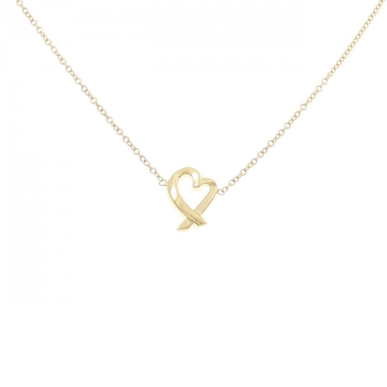 Loving heart necklace by Tiffany: Loving heart necklace by Tiffany Yellow gold necklace with a pendant bearing the Tiffany brand, featuring a heart-shaped design. The pendant measures 10mm x 7.7mm and is set in yellow gold, with a