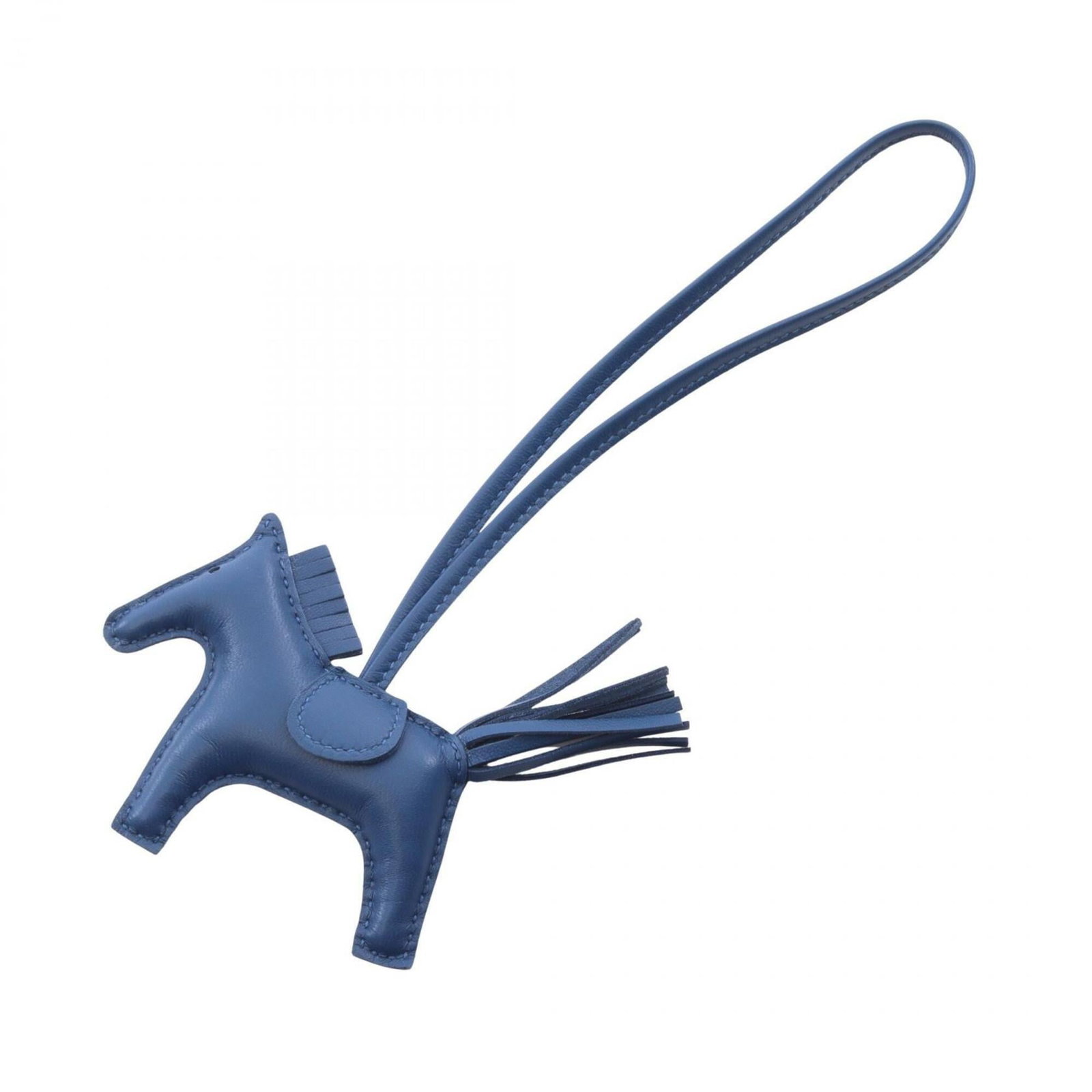 Hermes agneau handbag charm Milo: Hermes agneau handbag charm Milo Agneau Milo handbag charm from Hermes features blue color and material. Made by the renowned brand, this charm showcases a notable design element. The agneau material