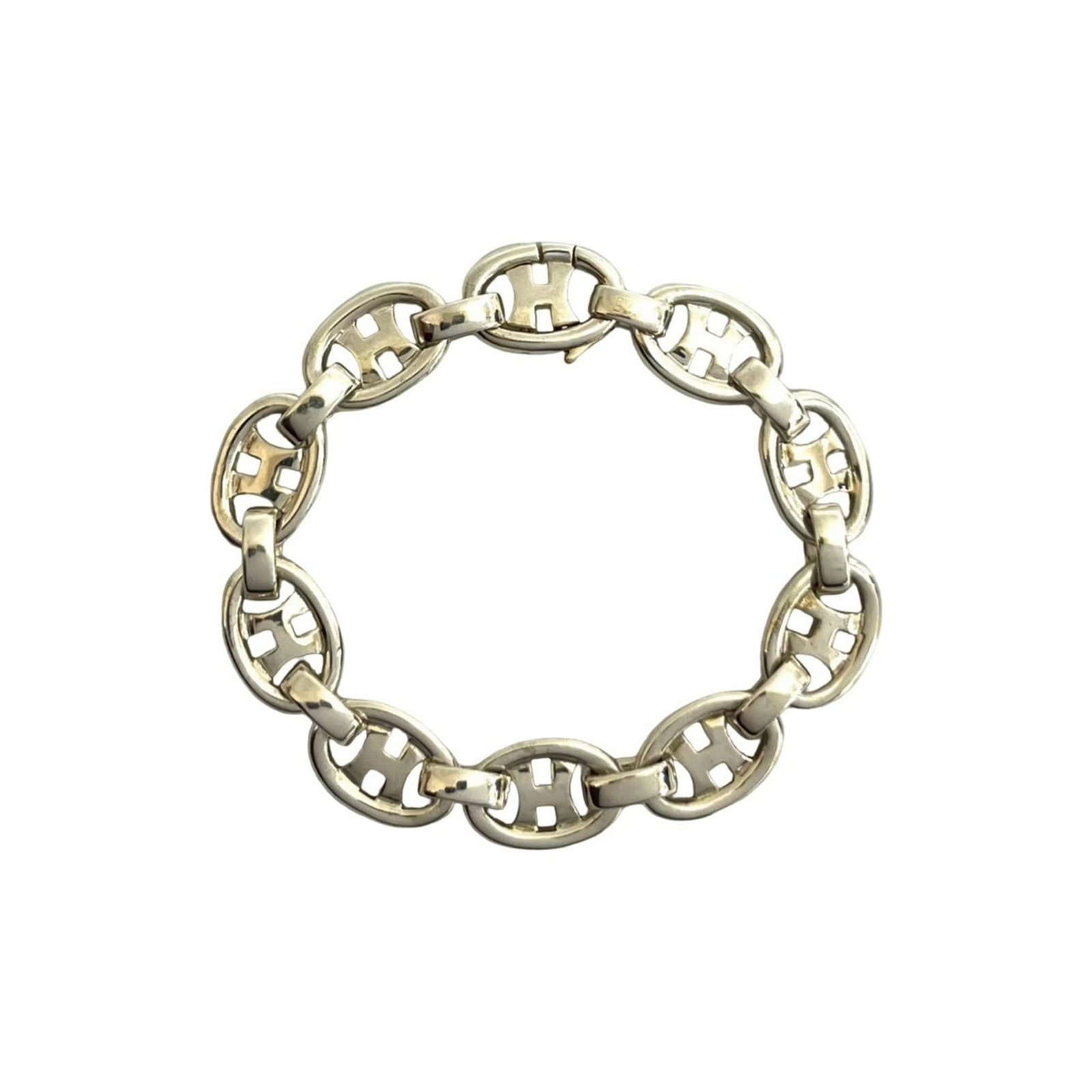Charm Bracelet Silver 925 by Hermes: Charm Bracelet Silver 925 by Hermes Silver 925 by Hermes Charm Bracelet, 18cm in length. This charm bracelet features the iconic brand's signature style, crafted from high-quality silver material. Wit