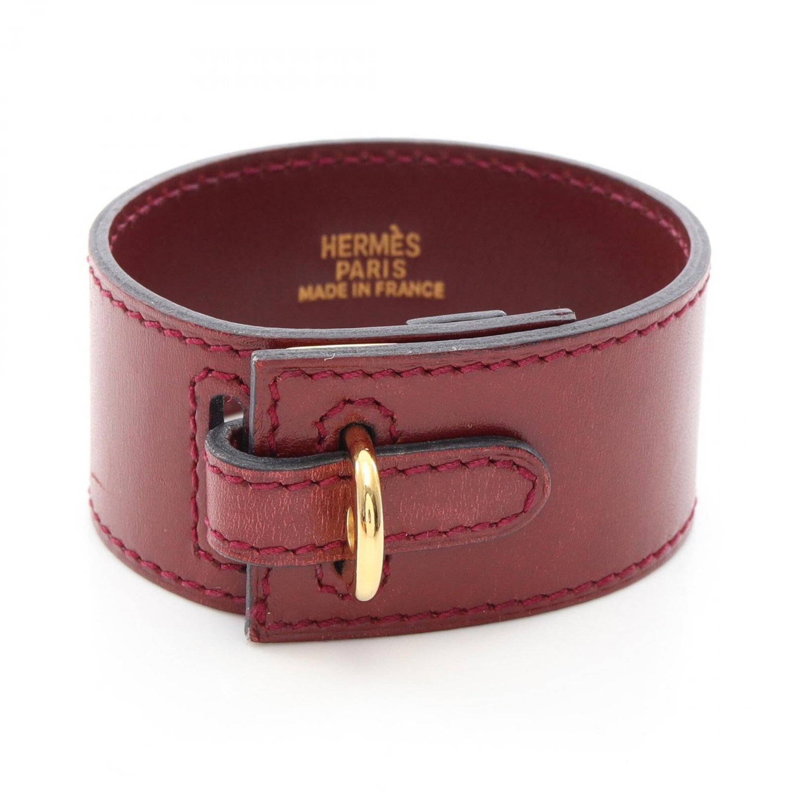 Hermes Charm Bracelet Gold Plating Leather: Hermes Charm Bracelet Gold Plating Leather Gold plating and rich red leather come together in this elegant Hermes charm bracelet, measuring 15.5cm in length. The gold plating adds a touch of luxury