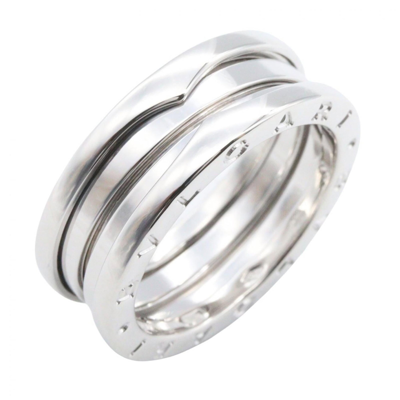 Bvlgari Band Ring White Gold (18K): Bvlgari Band Ring White Gold (18K) Bvlgari Band Ring White Gold (18K) - A sleek and sophisticated band ring in white gold, featuring the iconic Bvlgari brand. This 18K white gold piece boasts a
