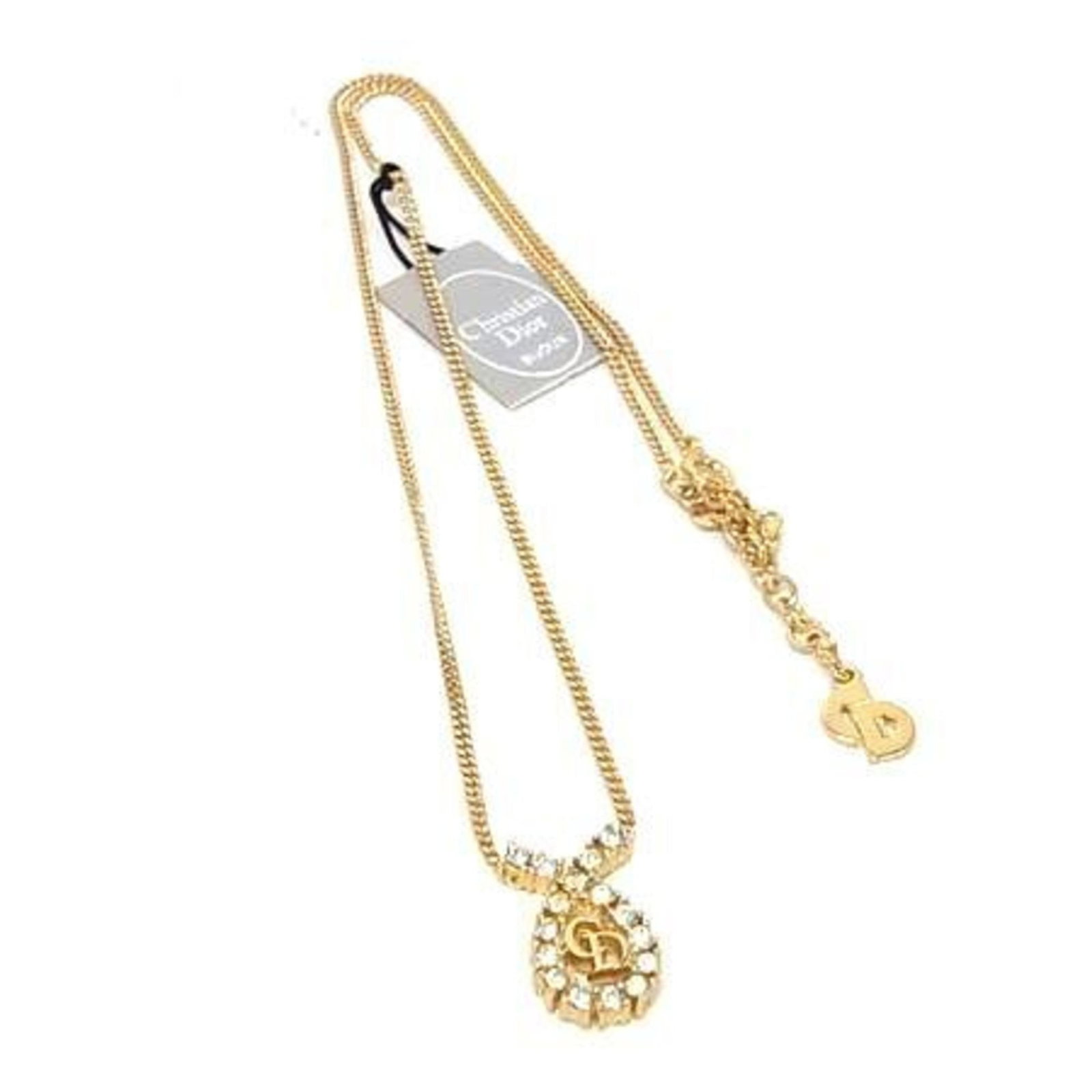 Christian Dior Women's Gold Metal Rhinestone Necklace: Christian Dior Women's Gold Metal Rhinestone Necklace Gold Metal Rhinestone Necklace from Christian Dior features a pendant with a 17mm x 10mm rhinestone design, set in a gold metal necklace with a