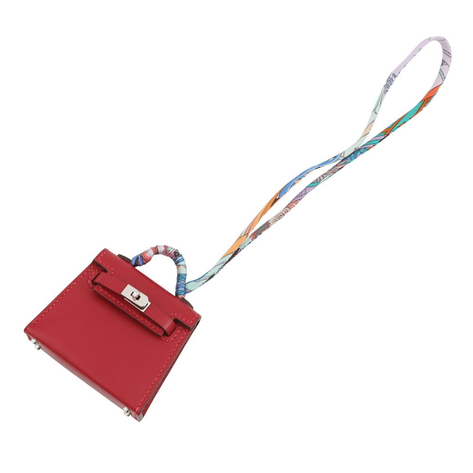 Silk Tadelakt Leather Handbag Charm Hermes: Silk Tadelakt Leather Handbag Charm Hermes Silk Tadelakt Leather Handbag Charm from Hermes bears a signature. Made with silk and tadelakt leather, this charm features the iconic Rouge vif color.