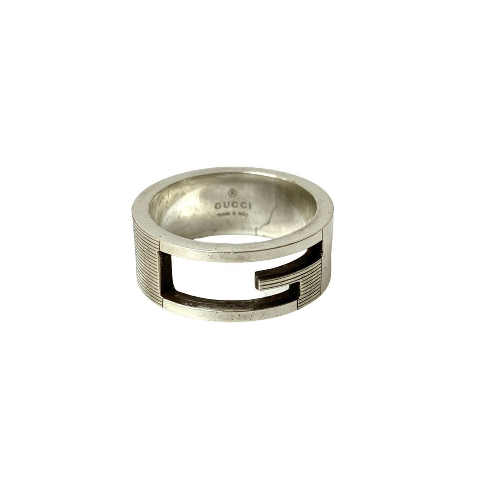 Gucci Band Ring Silver 925: Gucci Band Ring Silver 925 Silver 925 Gucci Band Ring for Men, Available in US Size 7 and JP Size 14. This elegant band ring features a sleek silver design from the renowned luxury brand Gucci. Made