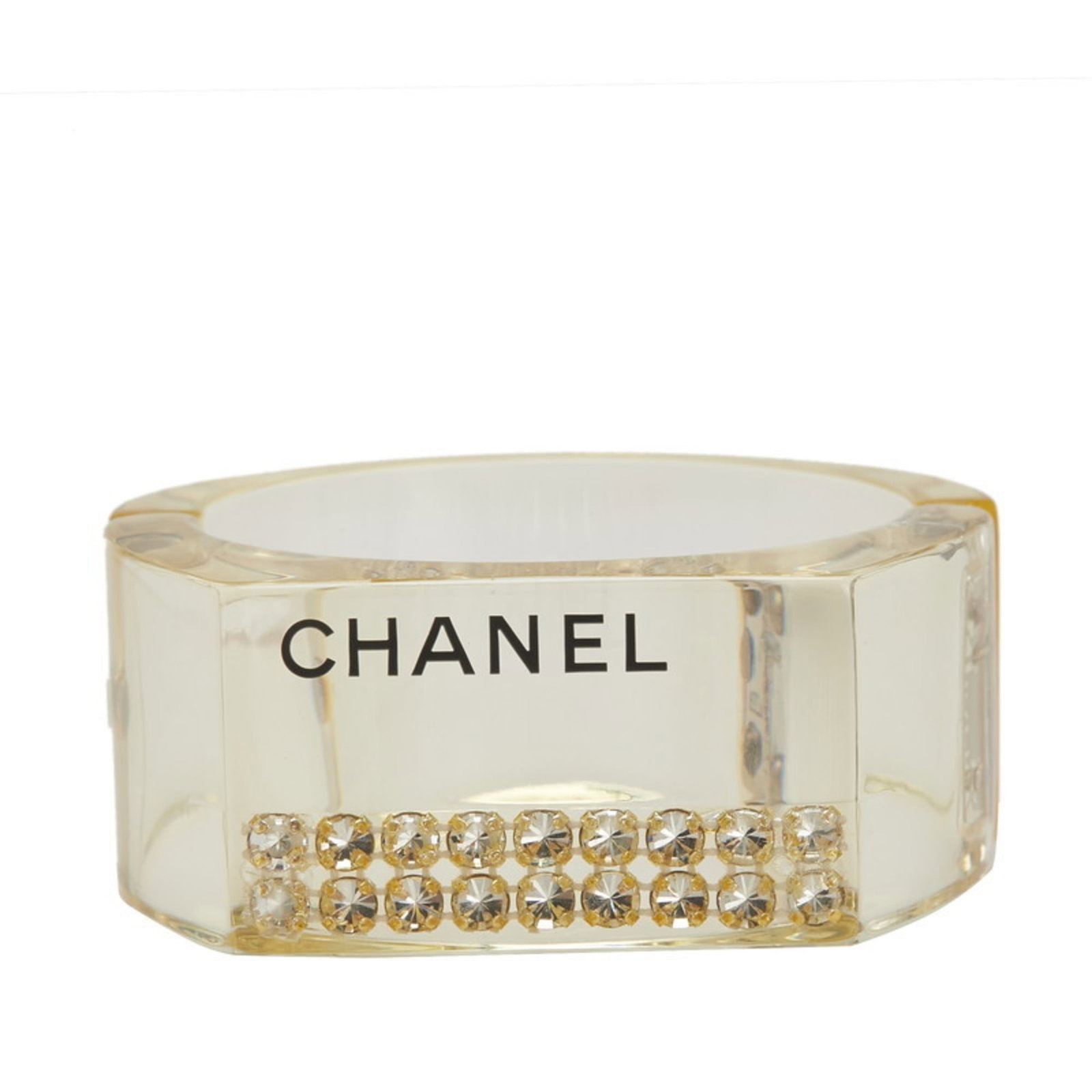 Plastic Rhinestone Chanel Bangle: Plastic Rhinestone Chanel Bangle Plastic Rhinestone Chanel Bangle boasts a striking clear and yellow stone rhinestone design, measuring 16.5cm in diameter and 22.5cm in total length. The bangle's