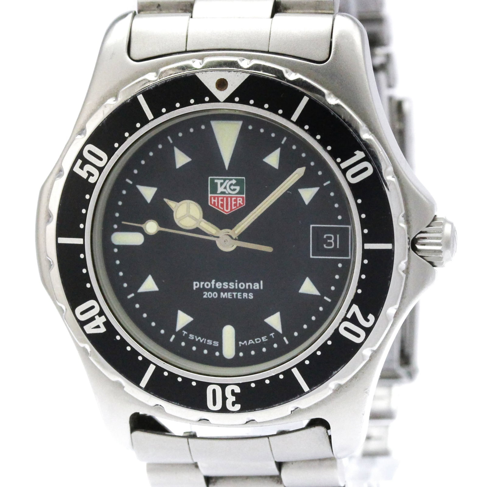 Wristwatch From Tag: Wristwatch From Tag Stainless steel case and band, the Tag Heuer Professional watch boasts a sleek black dial. With a quartz movement and date function, this sporty timepiece is designed for everyday