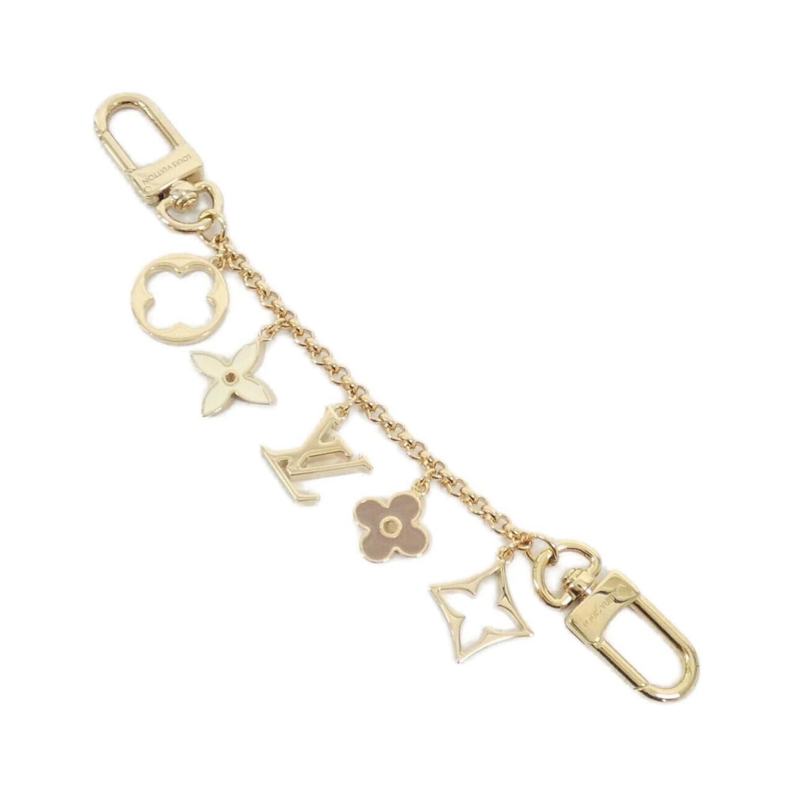 Louis Vuitton Handbag Charm: Louis Vuitton Handbag Charm Gold and Rose Louis Vuitton Handbag Charm - A stylish accent for your bag, bearing the iconic M01413 mark from renowned luxury brand Louis Vuitton. This charm showcases a