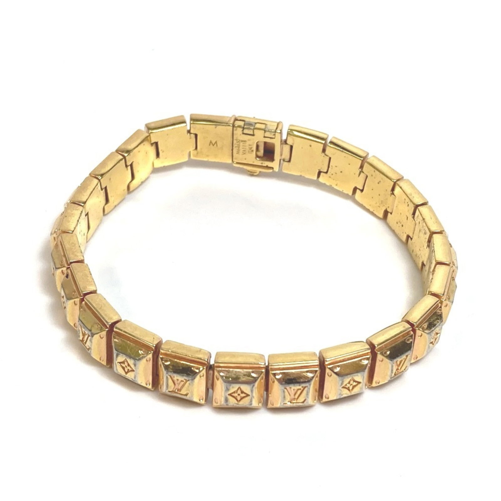 Louis Vuitton Tennis Bracelet Metal: Louis Vuitton Tennis Bracelet Metal Gold Louis Vuitton Tennis Bracelet with Signature. This gold tennis bracelet features the iconic Louis Vuitton design and bears a signature. Measuring 18cm in lengt