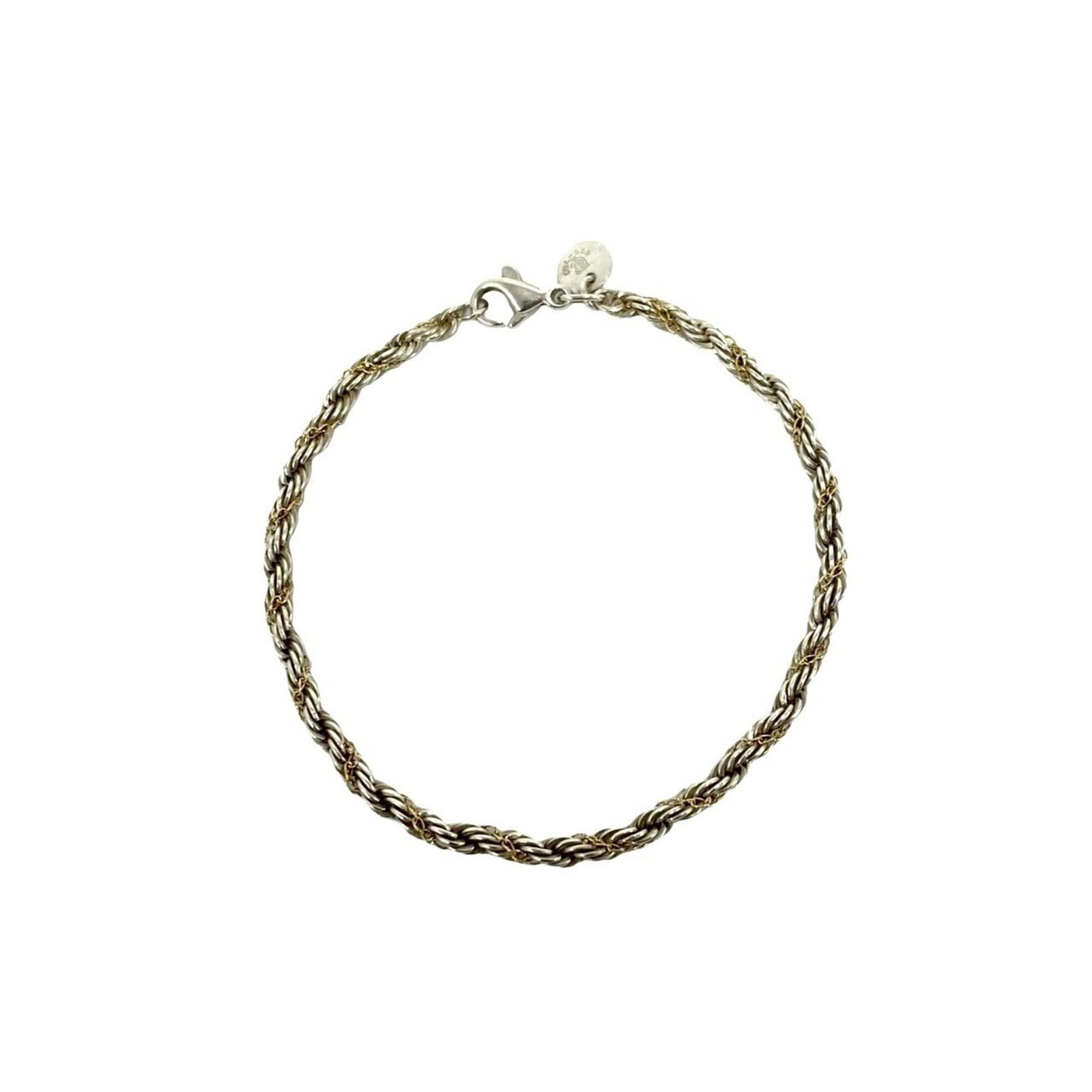 Charm Bracelet 925 Silver 18K Yellow Gold: Charm Bracelet 925 Silver 18K Yellow Gold Silver and 18K yellow gold come together in this elegant charm bracelet, measuring 18cm in length. The combination of these two metals adds a touch of