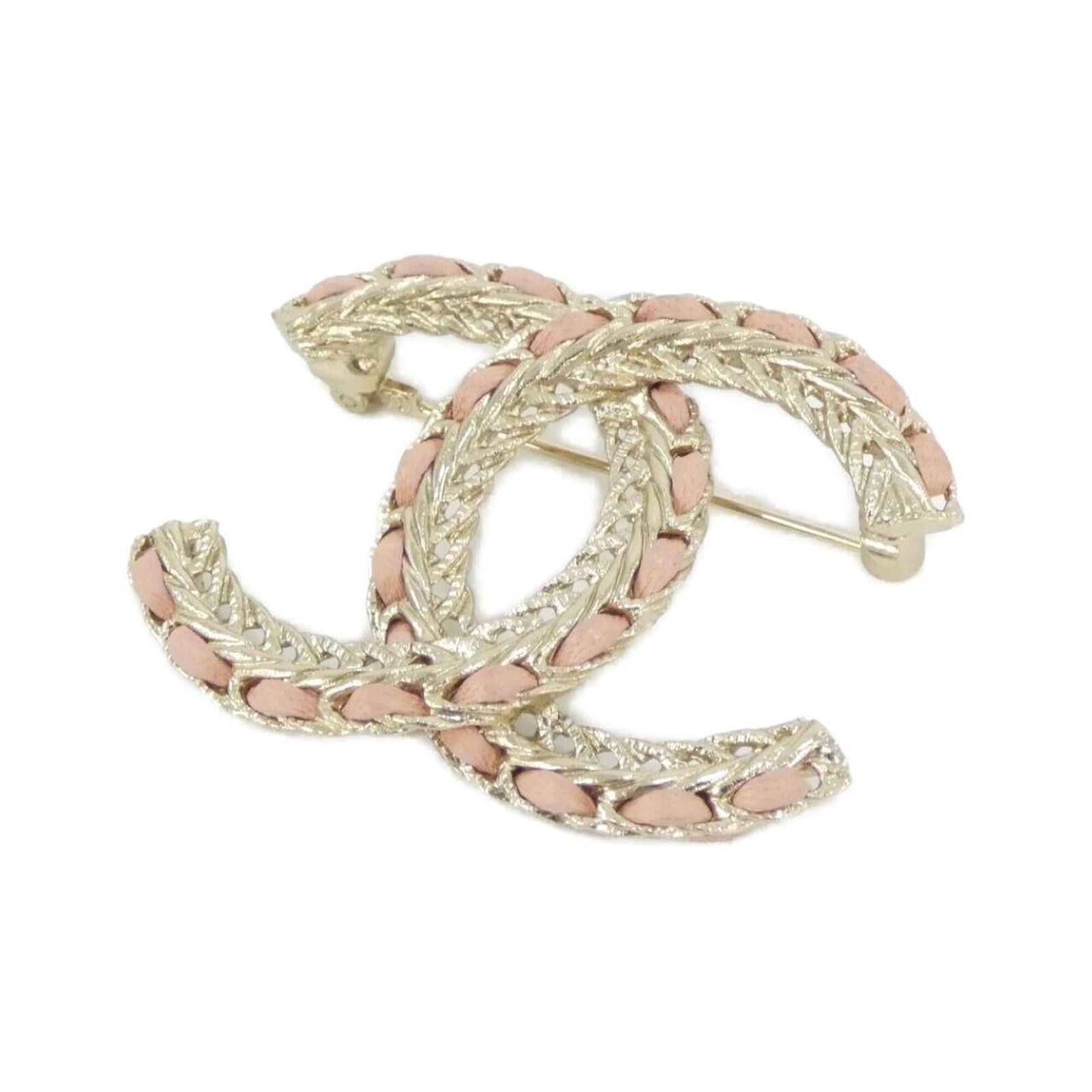 Chanel leather brooch: Chanel leather brooch Chanel's iconic leather brooch boasts a striking pink hue, adding a pop of color to any outfit. Crafted from high-quality leather, this stylish accessory measures 3.7cm x 5cm