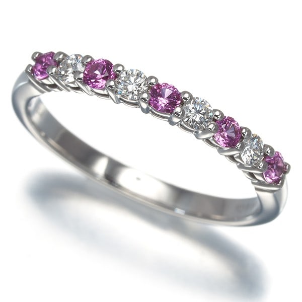 Tiffany&Co. Ring Pink Sapphire Diamond Forever Band Pt 950: Tiffany&Co. Ring Pink Sapphire Diamond Forever Band Pt 950 Tiffany & Co.'s platinum ring showcases a stunning pink sapphire and diamond combination, set in a timeless design. The unmarked carat