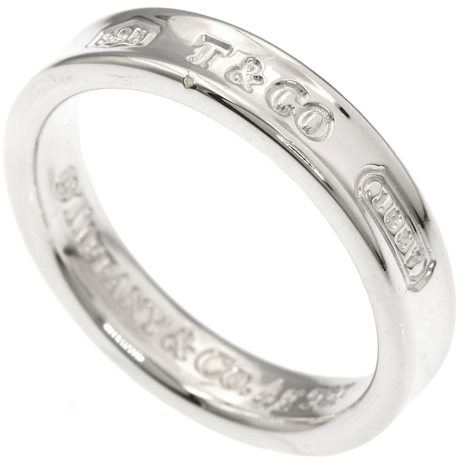 Silver Tiffany Band Ring: Silver Tiffany Band Ring Silver Tiffany Band Ring, available in US size 7 and JP size 14, features a sleek band design made from high-quality silver. This elegant ring bears the signature of its