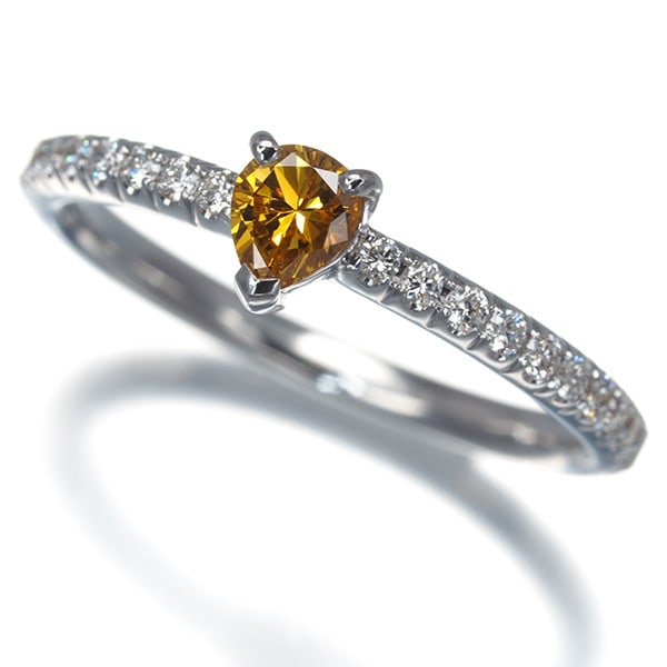 Orange Yellow &Clear Diamond 0.26Ct/ 0.26Ct Pear-Shaped Ring 18K 750 White Gold: Orange Yellow &Clear Diamond 0.26Ct/ 0.26Ct Pear-Shaped Ring 18K 750 White Gold 18k white gold provides a luxurious backdrop for this striking pear-shaped diamond ring, featuring two vibrant