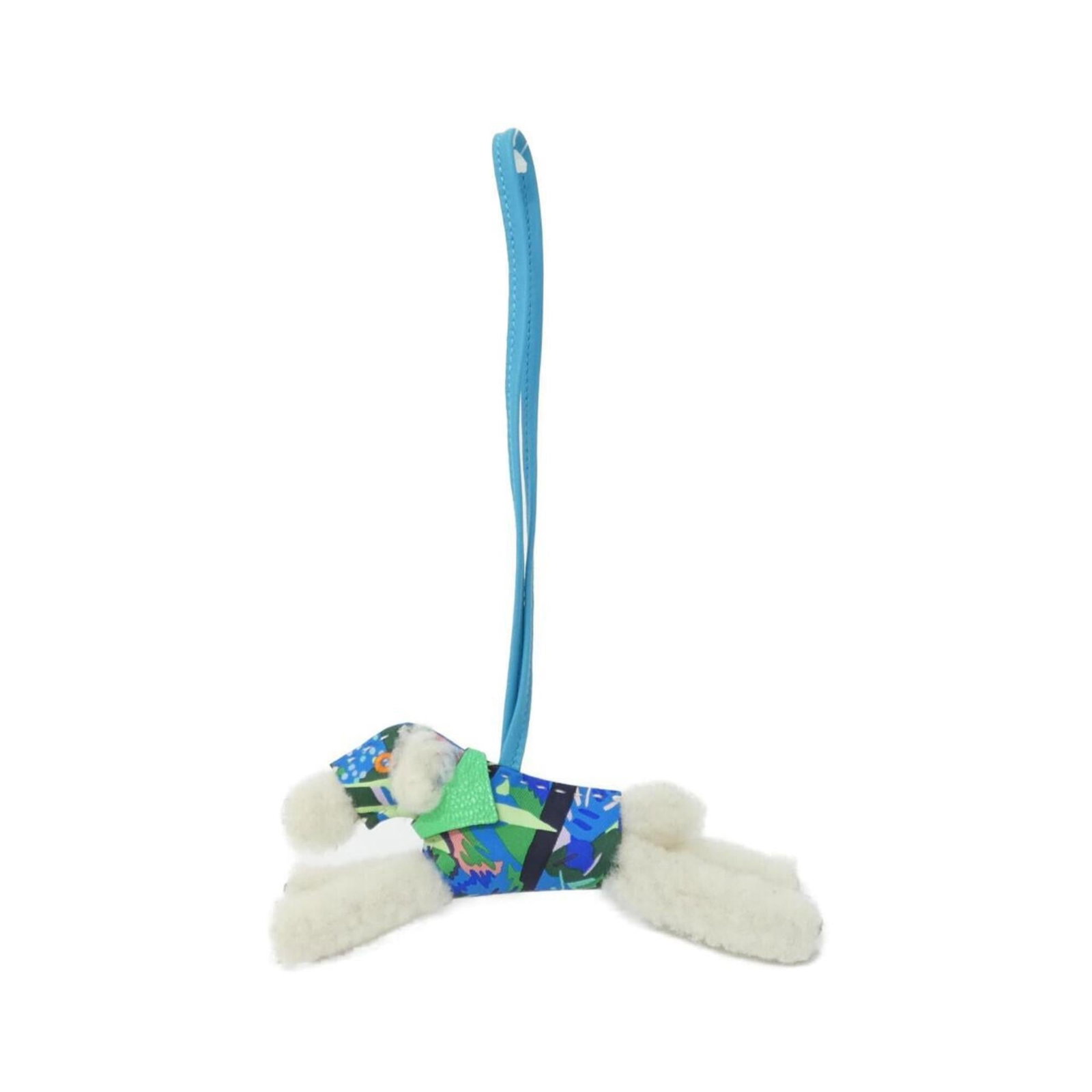 Hermes agneau handbag charm Milo: Hermes agneau handbag charm Milo Agneau Milo handbag charm from Hermes features a striking blue, ecru, and vert color combination. Measuring 60mm x 150mm with a chain length of 360mm, this charming