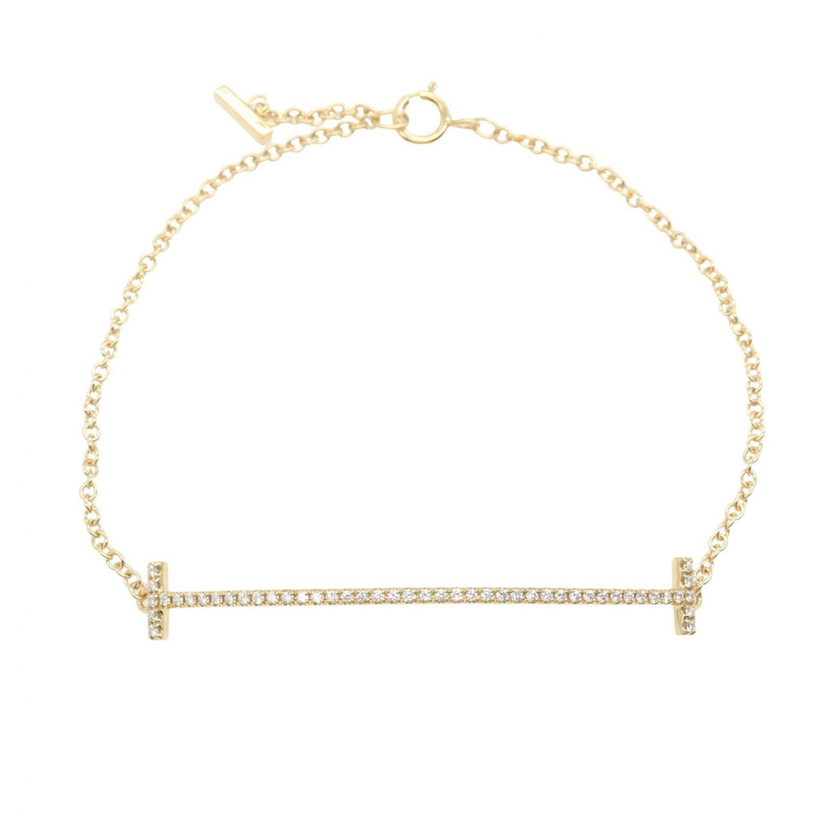 Tiffany Charm Bracelet Yellow Gold (18K): Tiffany Charm Bracelet Yellow Gold (18K) Yellow gold (18K) charm bracelet from Tiffany, featuring clear and yellow gold details. This 16cm long necklace showcases the iconic brand's signature style