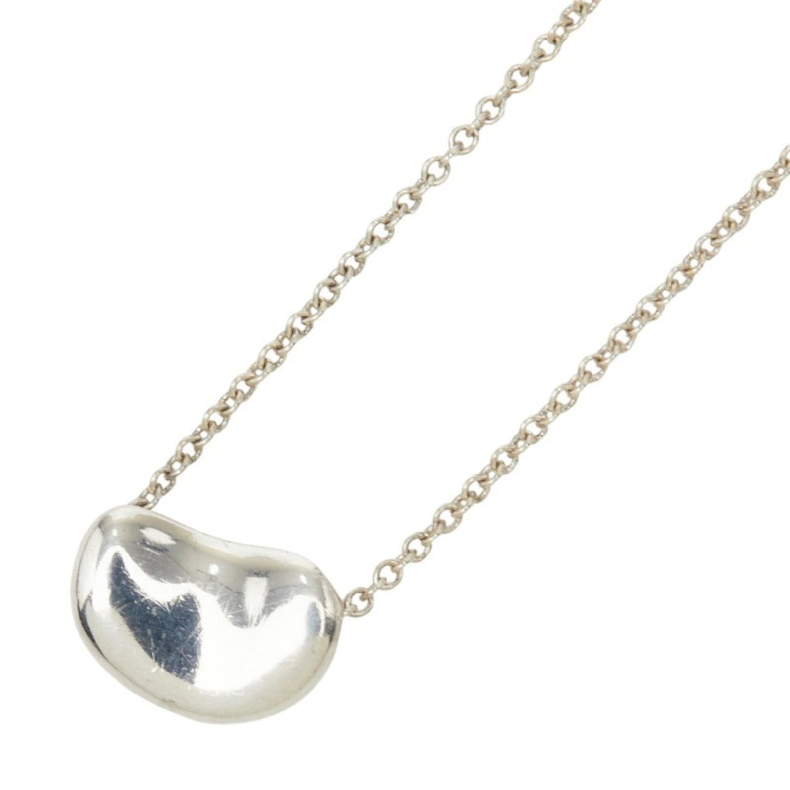 Tiffany & Co. Elsa Peretti Bean Necklace Sv925 Silver Women'S.: Tiffany & Co. Elsa Peretti Bean Necklace Sv925 Silver Women'S. Tiffany & Co.'s Elsa Peretti Bean Necklace is a sleek and modern design, featuring a sterling silver pendant with a signature from the