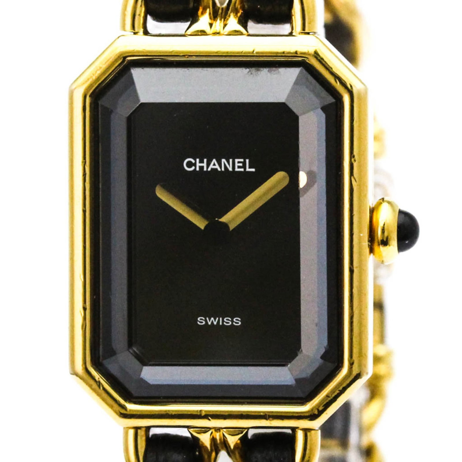 Chanel Wristwatch: Chanel Wristwatch Gold plated case and leather band add a touch of elegance to this sleek Chanel wristwatch, featuring a black dial and quartz movement. Weighing in at just 50g, this petite timepiece