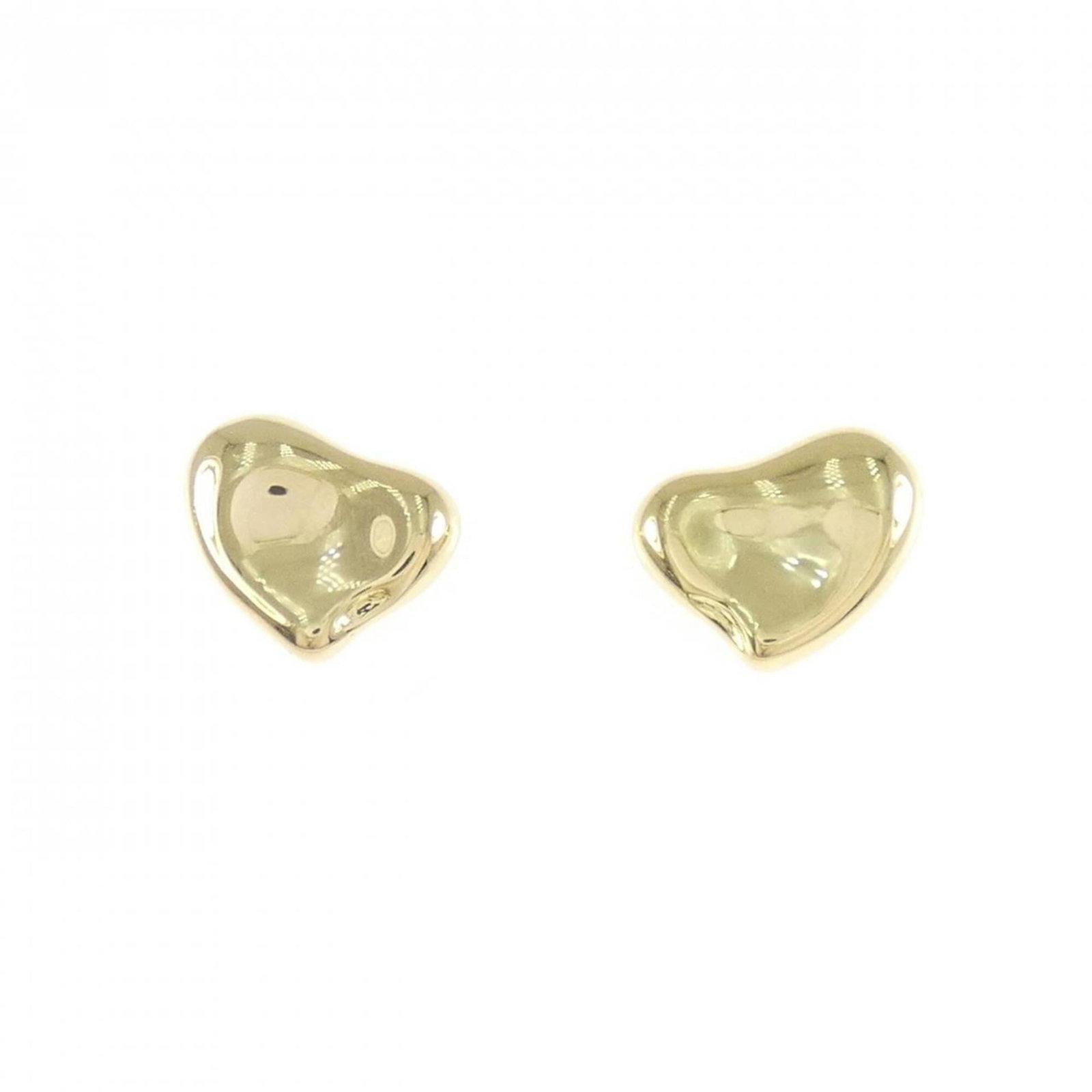 Stud earrings yellow gold 18k: Stud earrings yellow gold 18k Yellow gold 18k stud earrings with a sleek, understated design. Measuring 7.50mm in height and 9.80mm in width, these earrings are crafted from high-quality yellow gold