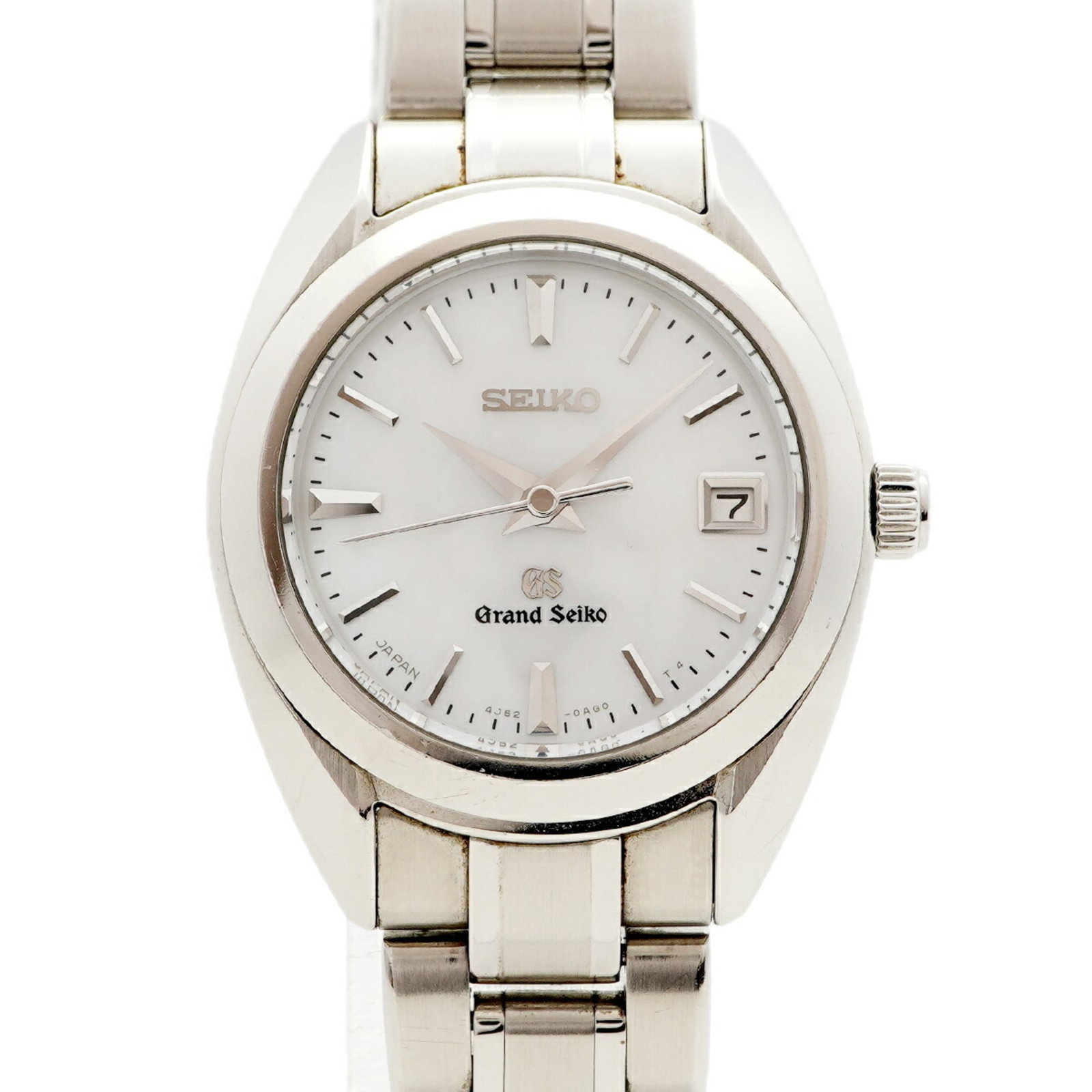 Wristwatch by Seiko: Wristwatch by Seiko Stainless steel band adds a touch of modern elegance to this sleek Seiko wristwatch, featuring a white dial and quartz movement. The compact 26mm case makes it suitable for