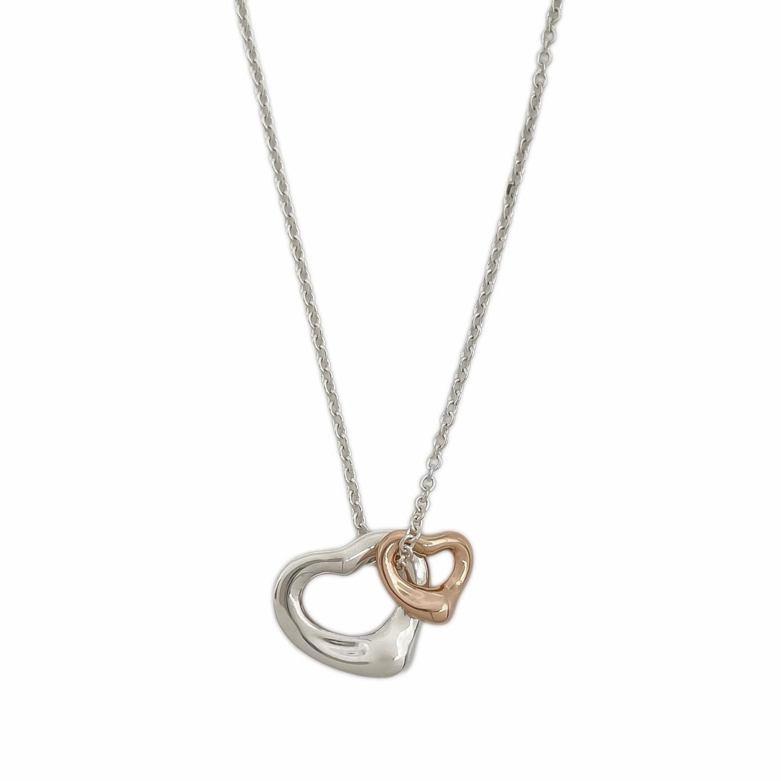 Women's silver Sv925 necklace Tiffany: Women's silver Sv925 necklace Tiffany Silver 925 necklace with a Tiffany pendant, featuring rose gold (18K) and silver details. The necklace has a comfortable 40.5 cm circumference and a 7mm x 7mm pen