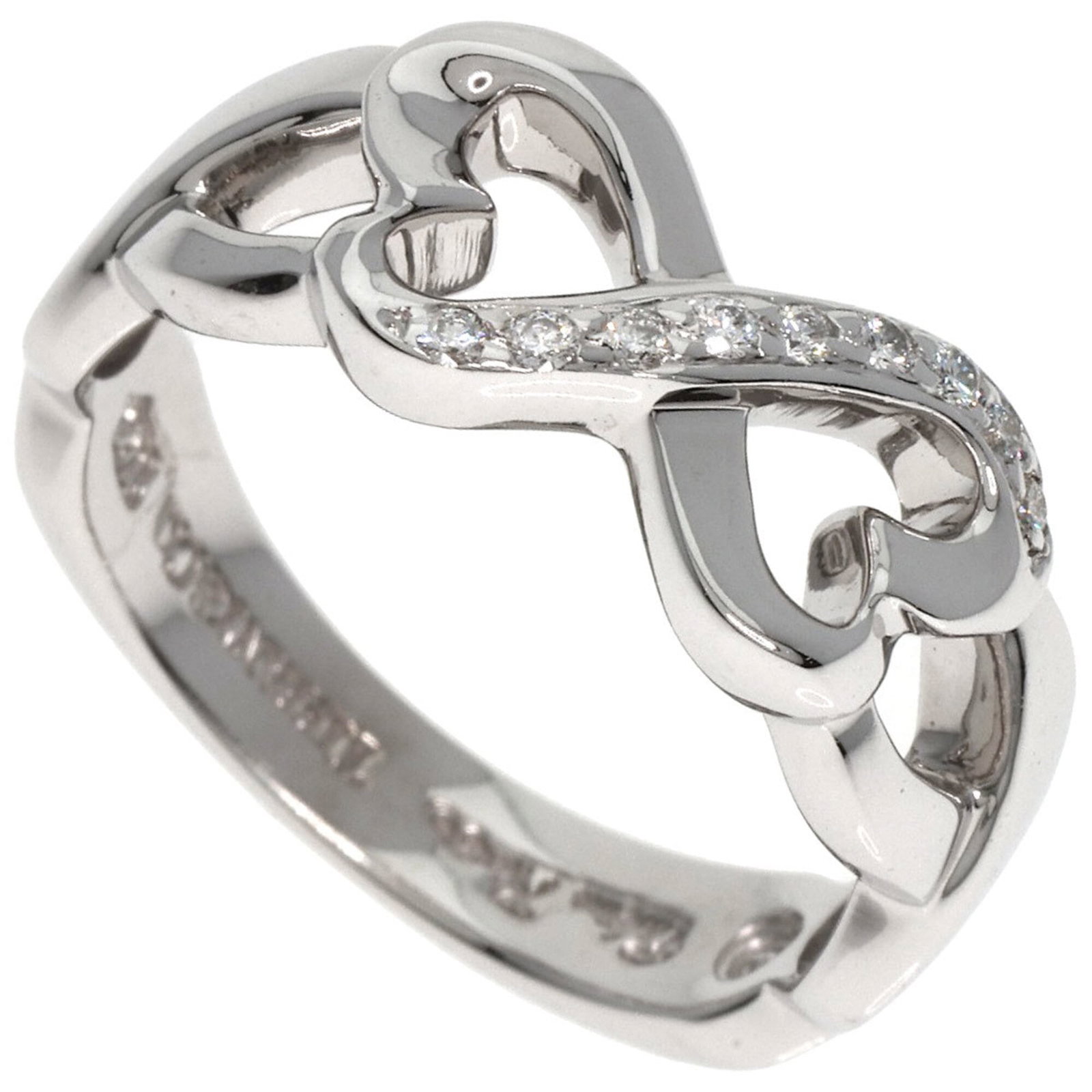 White Gold Ring Band Tiffany: White Gold Ring Band Tiffany 18K white gold band ring from Tiffany, featuring a diamond stone. This US size 4.5 and JP size 8 ring showcases the luxury of Tiffany's signature style. A beautiful piece