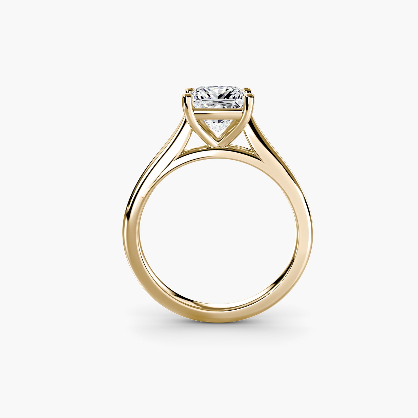 Solitaire Princess 14Kt Yellow Gold Ring Setting: Solitaire Princess 14Kt Yellow Gold Ring Setting 14Kt Yellow Gold Princess Ring Setting for the Perfect Center Stone. This stunning ring setting boasts a sleek princess shape, adorned with two side
