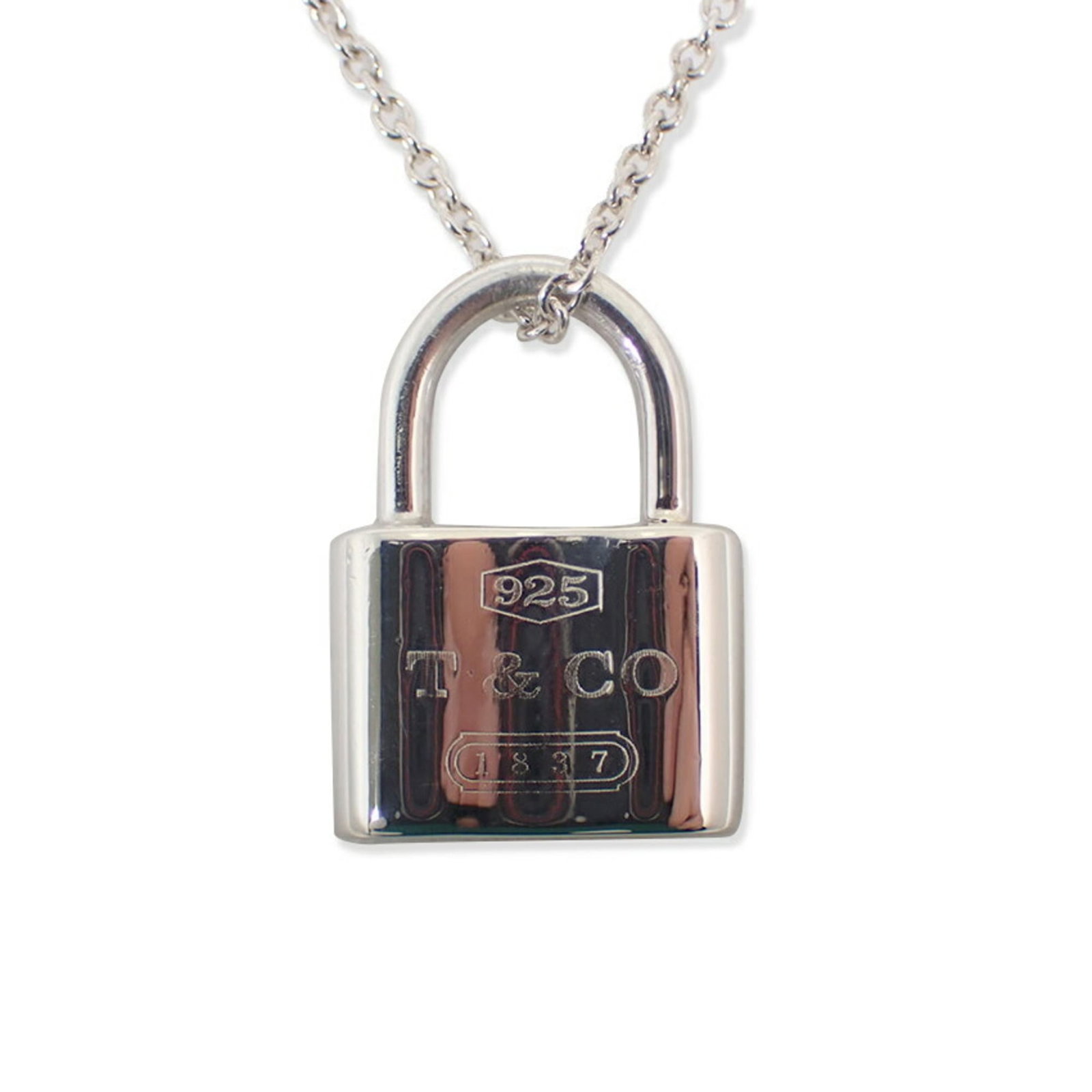 Tiffany & Co. 925 1837 Cadena Pendant Necklace: Tiffany & Co. 925 1837 Cadena Pendant Necklace Sterling silver 925, the Tiffany & Co. Cadena Pendant Necklace boasts a classic design with a 20mm x 14.5mm pendant that measures 0.78'' x 0.57''. This