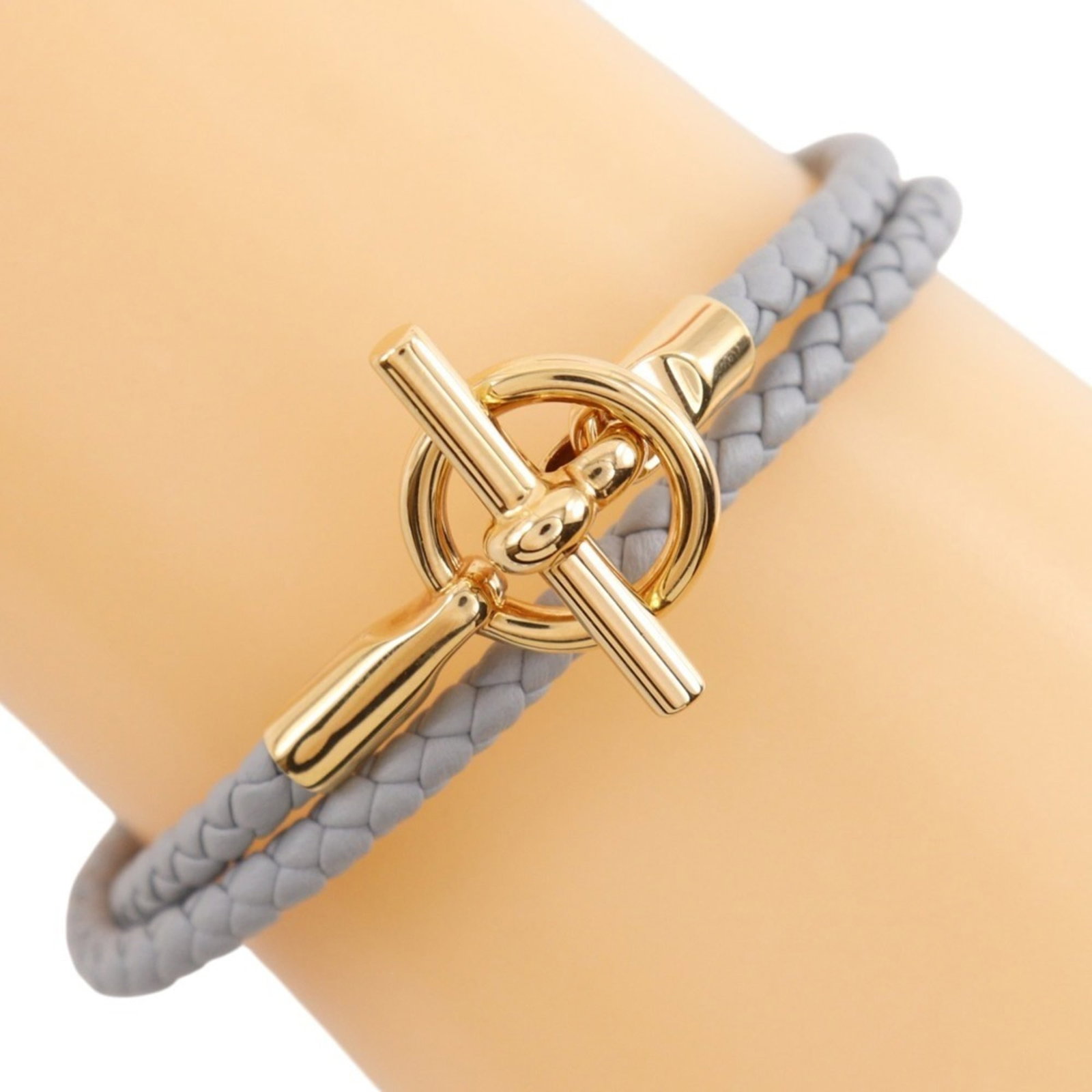 Hermes Leather Charm Bracelet: Hermes Leather Charm Bracelet The Hermes Leather Charm Bracelet boasts a sleek gray leather design, measuring 15.5cm in length and weighing 8.6g. Its total length extends to 35cm, making it a versatil