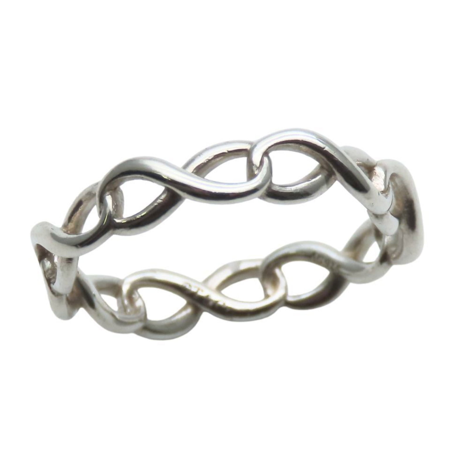 Silver 925 Tiffany Band Ring: Silver 925 Tiffany Band Ring Silver 925 Tiffany Band Ring features a sleek design made from high-quality silver material, with a US size of 4.5 and JP size of 8.5. Comes with a dust bag for added prot