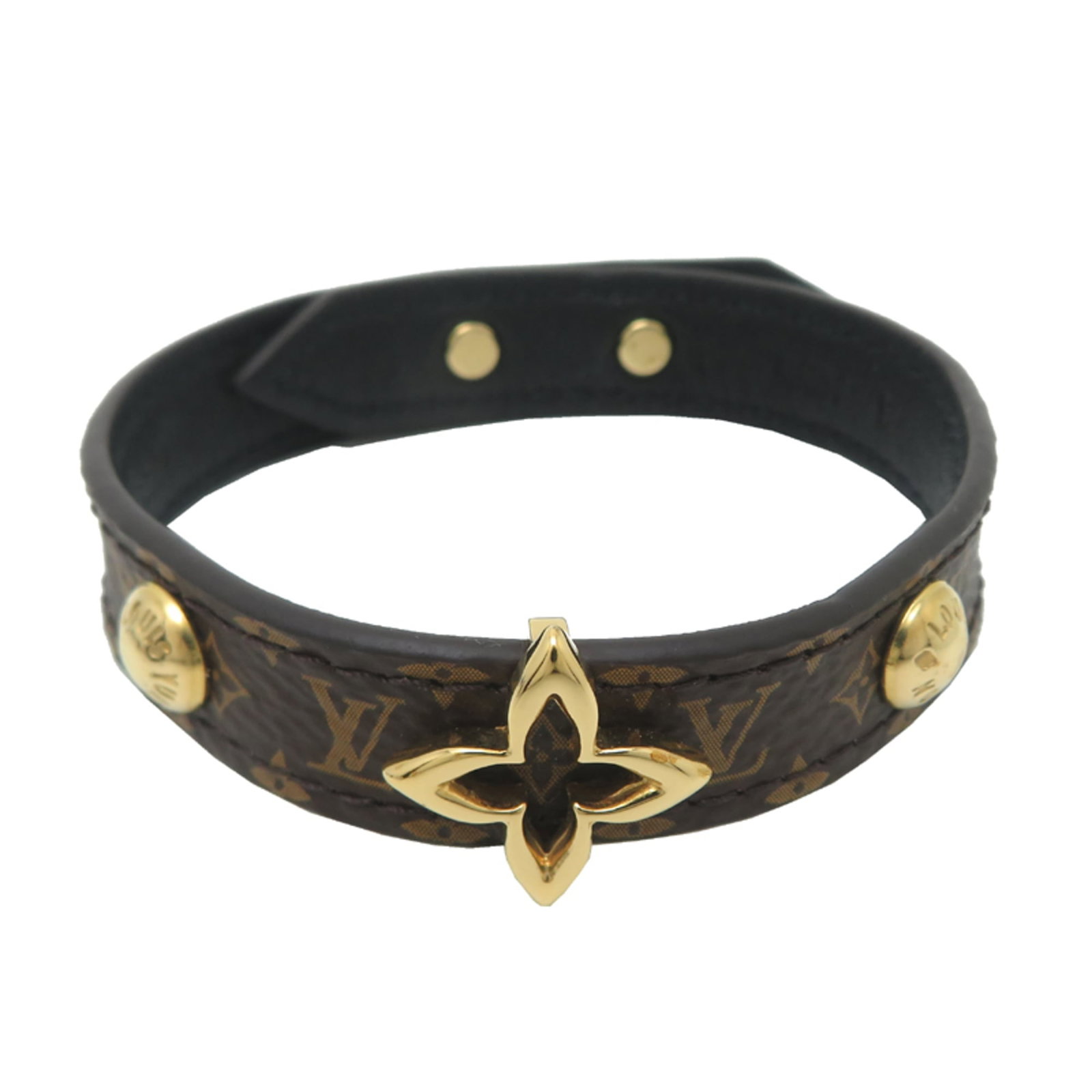 Charm bracelet leather monogram Louis Vuitton: Charm bracelet leather monogram Louis Vuitton Brown leather monogram charm bracelet from Louis Vuitton, featuring the iconic M6534 design. Made with high-quality materials, this 19.5cm long charm