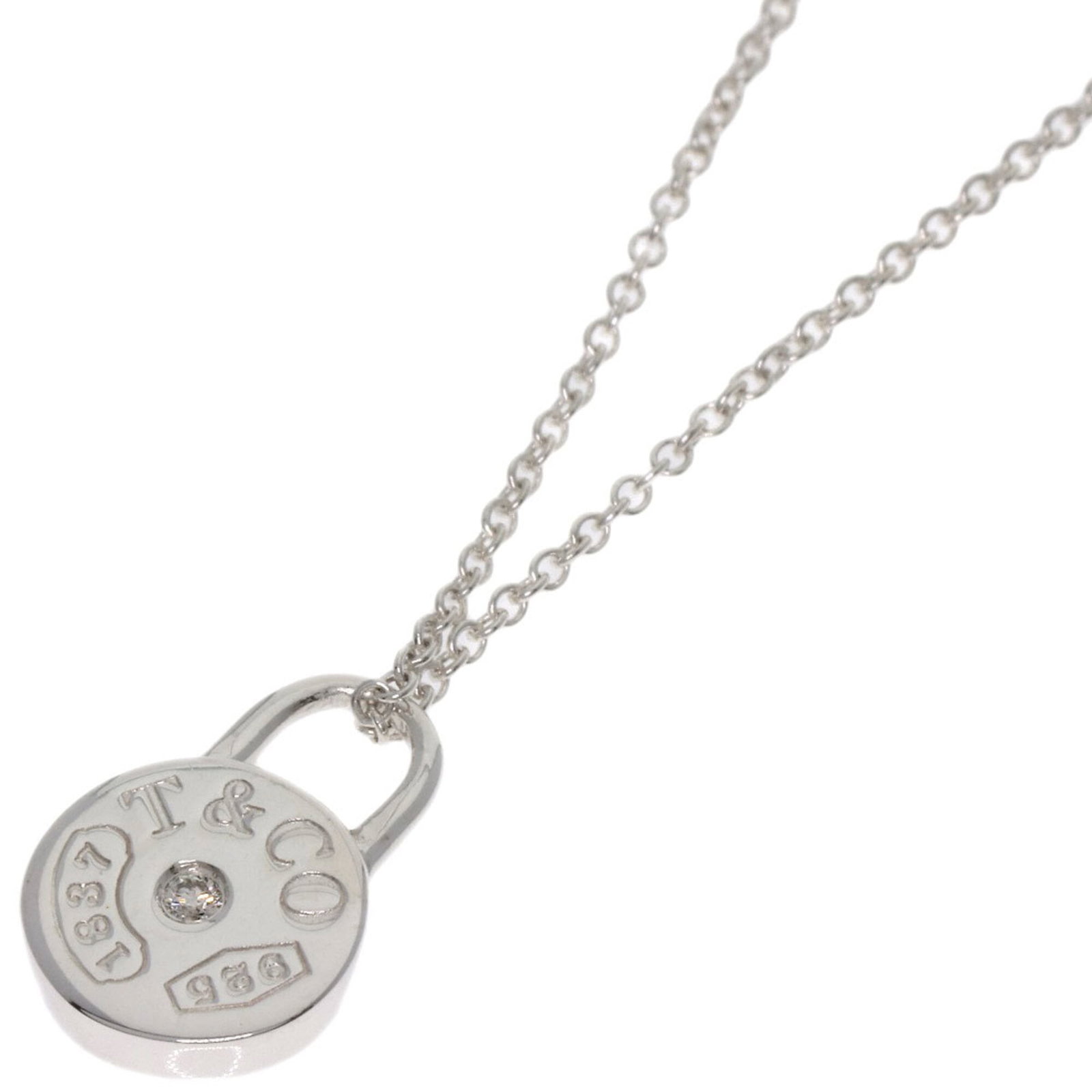 Tiffany & Co. 1837 Round Rock Diamond Necklace Silver Women'S.: Tiffany & Co. 1837 Round Rock Diamond Necklace Silver Women'S. Tiffany & Co. 1837 Round Rock Diamond Necklace Silver Women'S features a stunning silver necklace with a round rock diamond pendant,