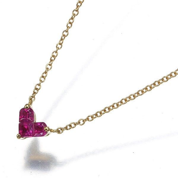 Mysterious Ruby Necklace Star Jewelry 0.13ct 18k 750 Yellow Gold Heart: Mysterious Ruby Necklace Star Jewelry 0.13ct 18k 750 Yellow Gold Heart Yellow gold pendant shaped like a heart, featuring a natural ruby stone weighing 0.13ct, suspended from an 18k yellow gold chain