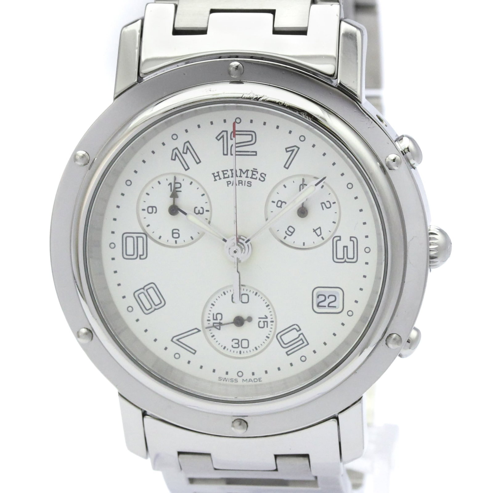 Hermes Wristwatch: Hermes Wristwatch Stainless steel case and band provide a sleek, sporty look for the Hermes Clipper Wristwatch. The quartz movement ensures accurate timekeeping, with additional features like chronogr